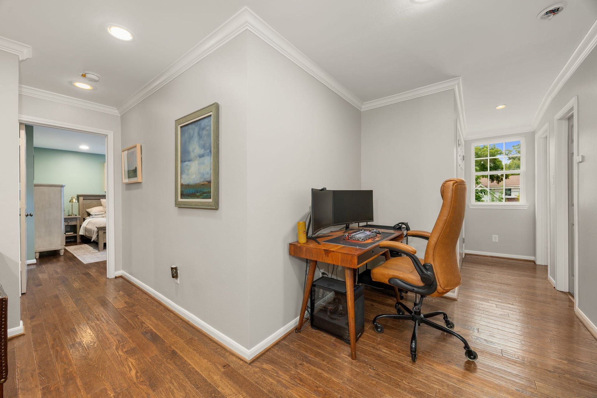 10831 Britoak Lane, Houston, TX 77079 Upstairs TV room has room for a desk or office.