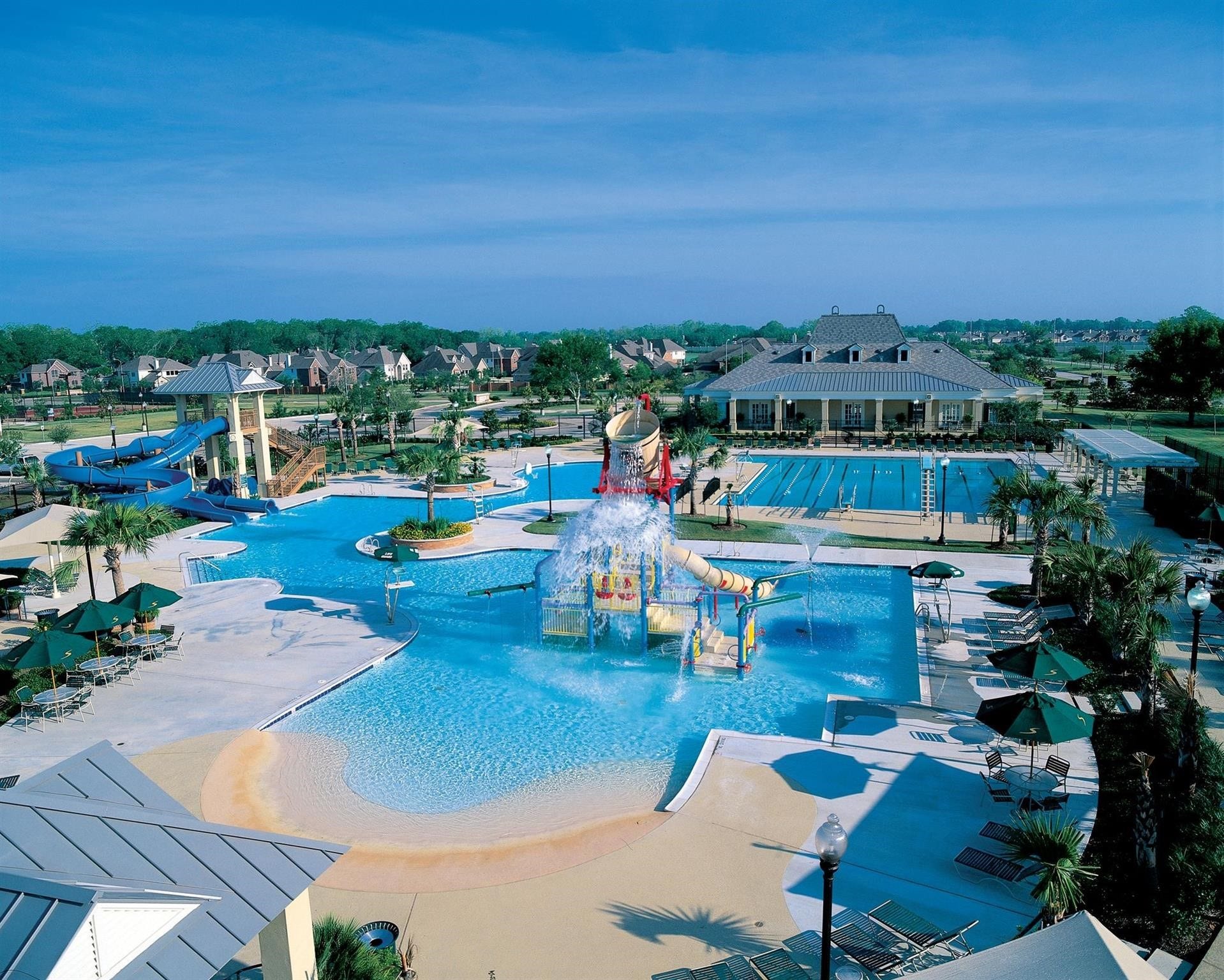 3707 Cat Springs Lane, Missouri City, TX 77459 Resort-style pool in Sienna, Richmond TX, a master-planned community offering multiple waterparks, including splash pads, slides, and lap pools designed for year-round resident enjoyment.