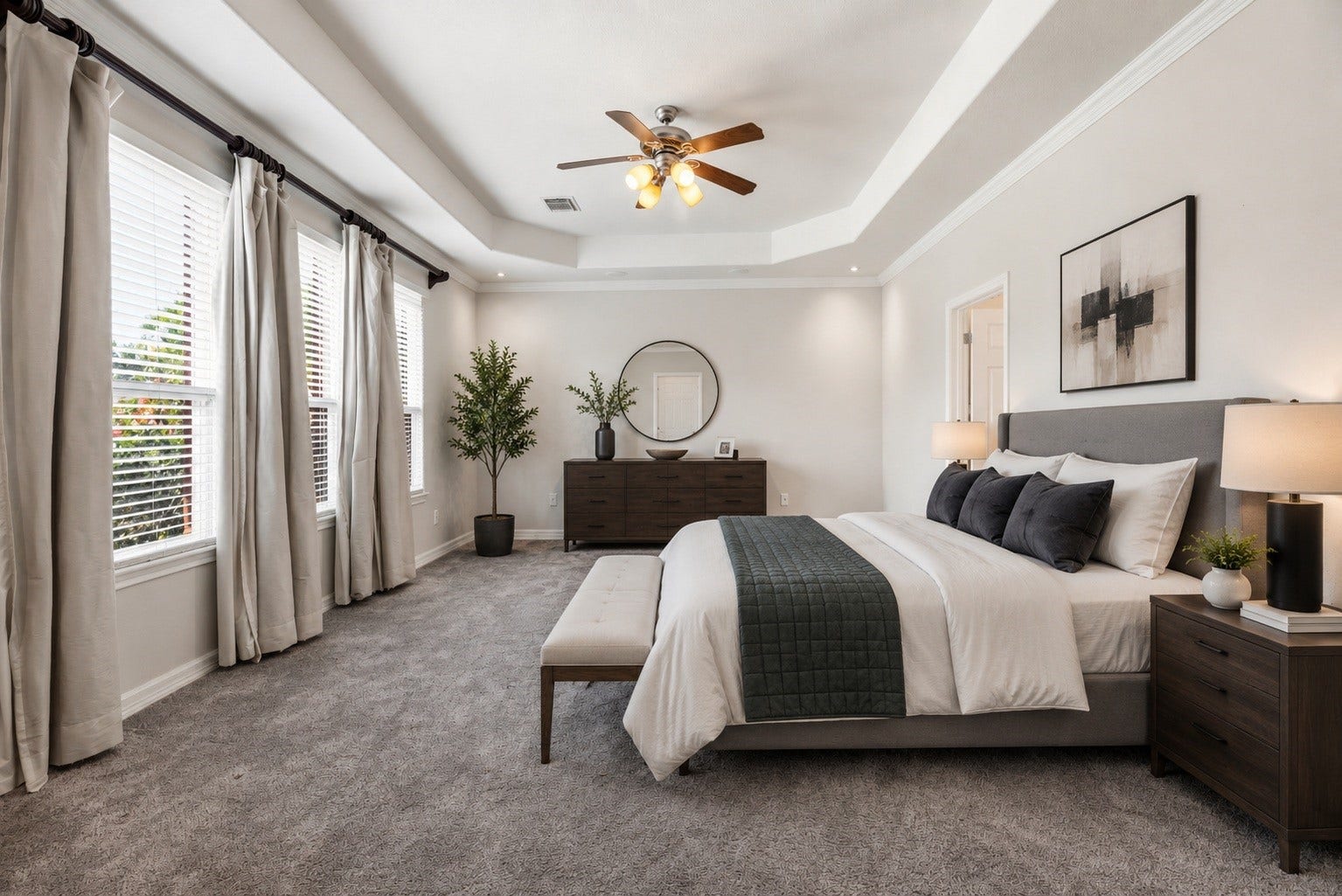 3707 Cat Springs Lane, Missouri City, TX 77459 Located on the first floor for ultimate convenience, the primary bedroom serves as a peaceful retreat featuring high ceilings and a wall of windows. Virtually staged.