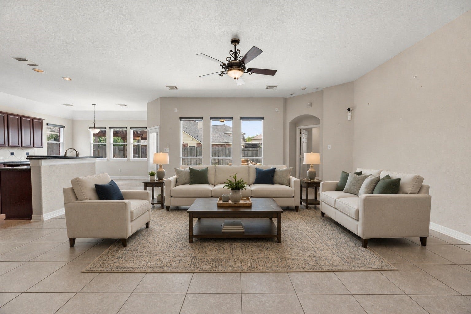 3707 Cat Springs Lane, Missouri City, TX 77459 The open-concept design ensures the family room flows effortlessly into the gourmet kitchen, maintaining a bright and airy atmosphere throughout the main living areas. Virtually staged.