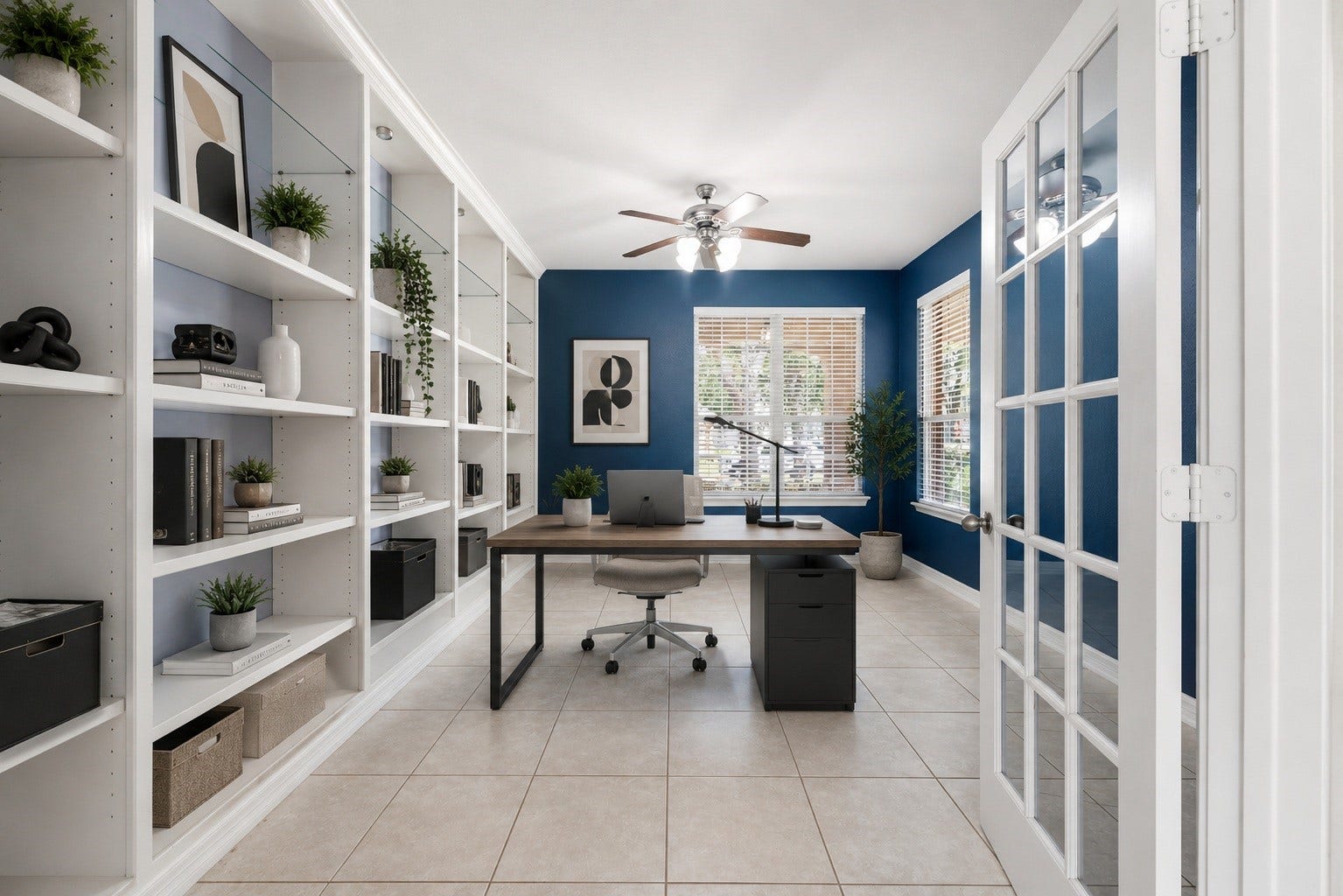 3707 Cat Springs Lane, Missouri City, TX 77459 An executive home office provides a quiet sanctuary for productivity, showcased by double French doors, extensive custom built-in shelving, and plenty of natural light. Virtually staged.