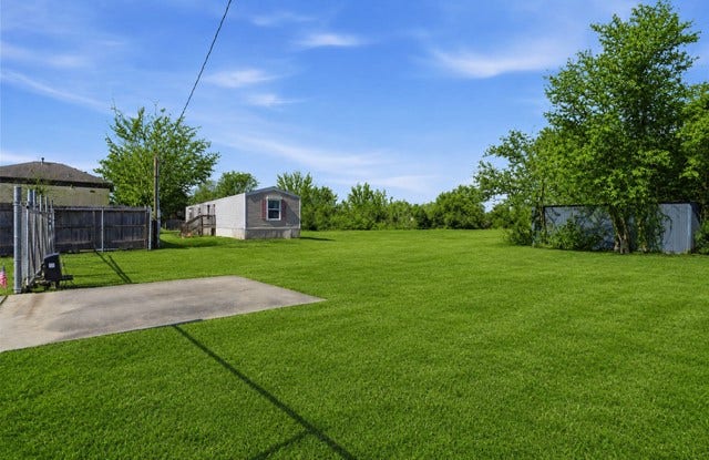 801 Genoa Red Bluff Road, Pasadena, TX 77504 aerial view enter the driveway on rightside of fence