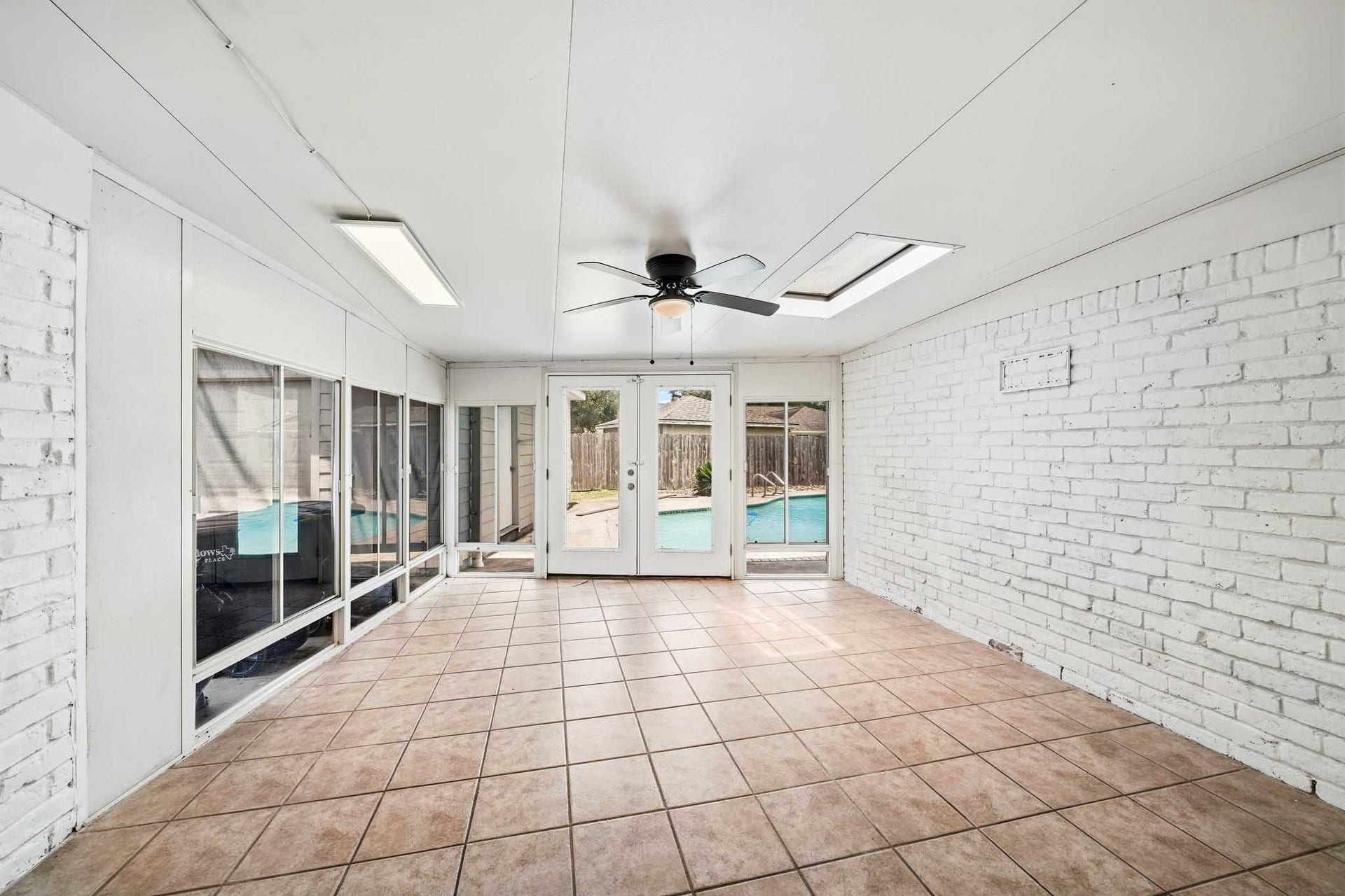 12010 Dorrance Lane, Meadows Place, TX 77477 The patio was converted into a sunroom or game room.