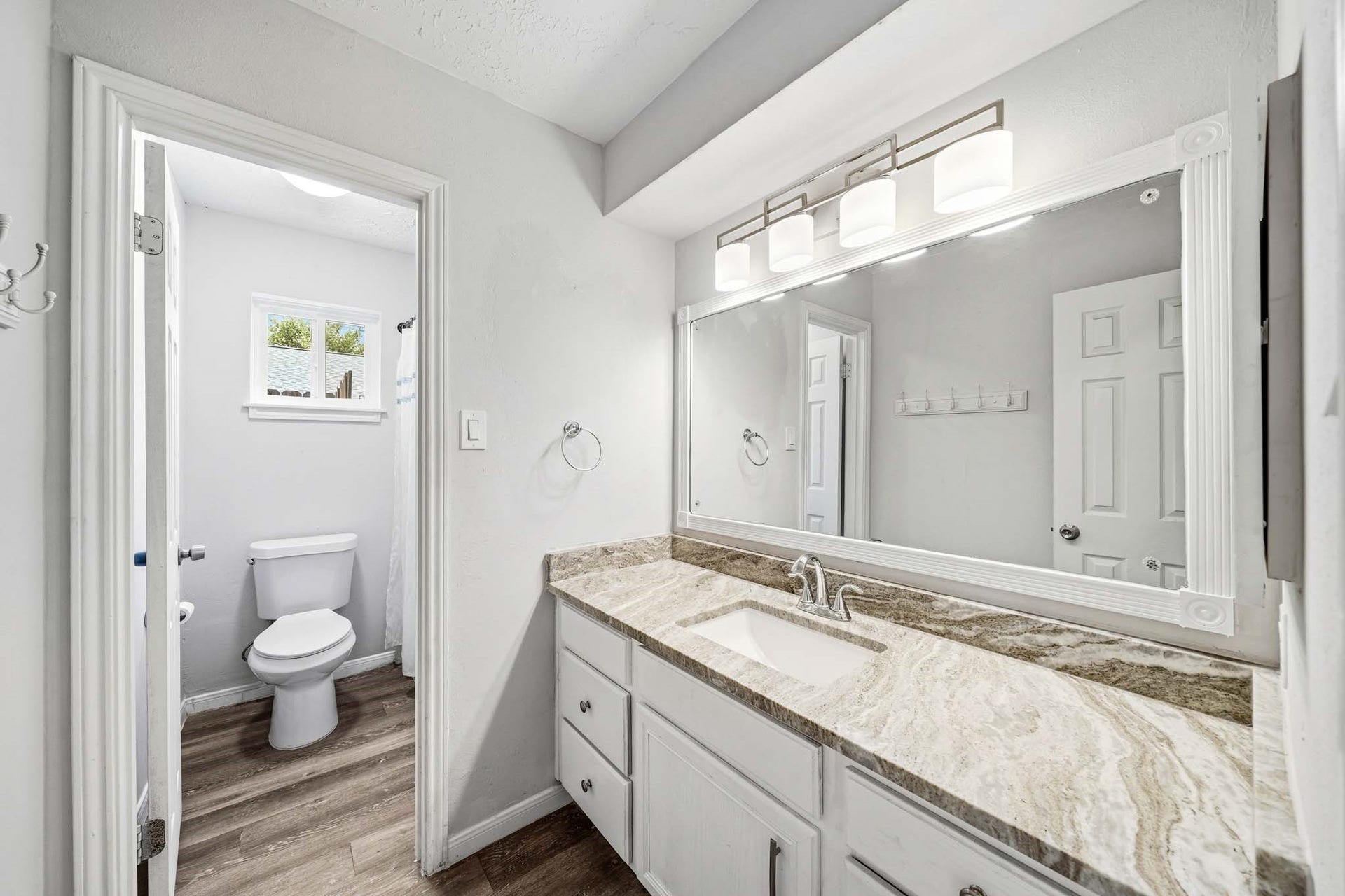 12010 Dorrance Lane, Meadows Place, TX 77477 The secondary bathroom is as lovely as the primary bath and is compartmented for the convenience of the users.