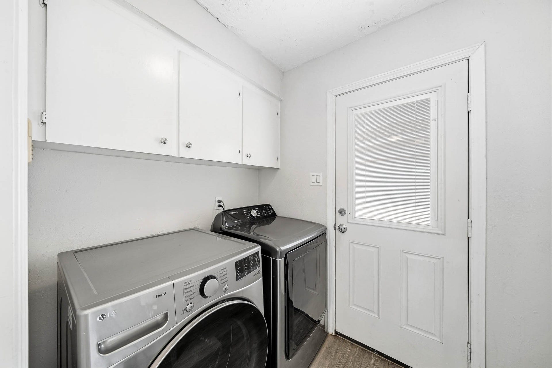 12010 Dorrance Lane, Meadows Place, TX 77477 The utility room provides extra storage.