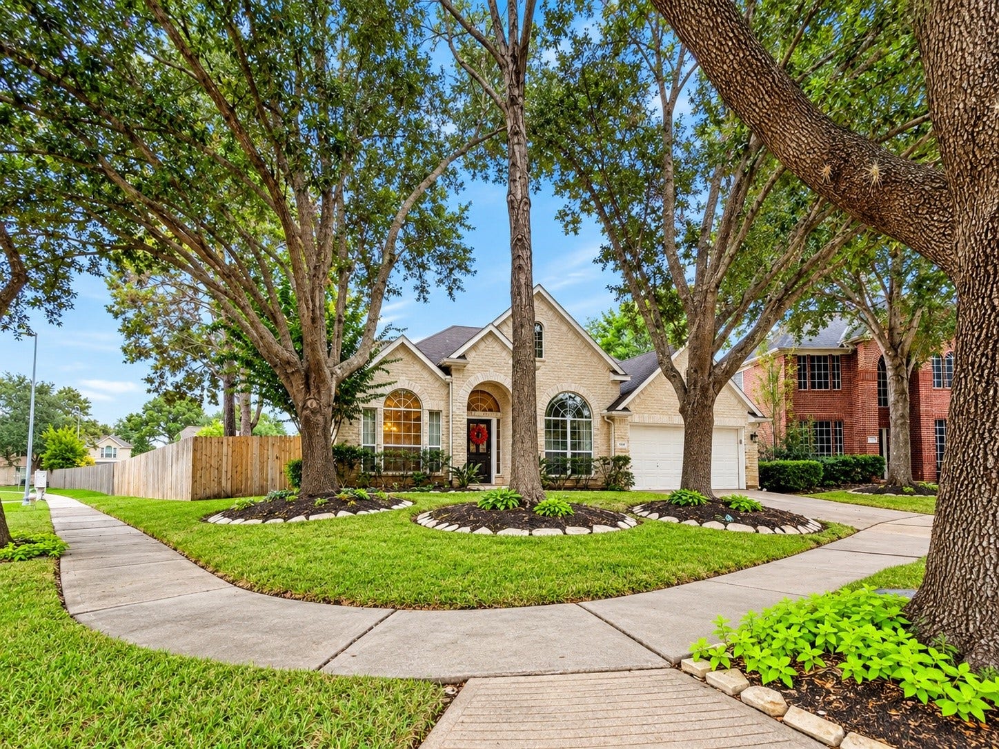 5810 Larch Leaf Lane, Richmond, TX 77469 Expansive corner-lot setting offers extra green space and a peaceful, established neighborhood feel.