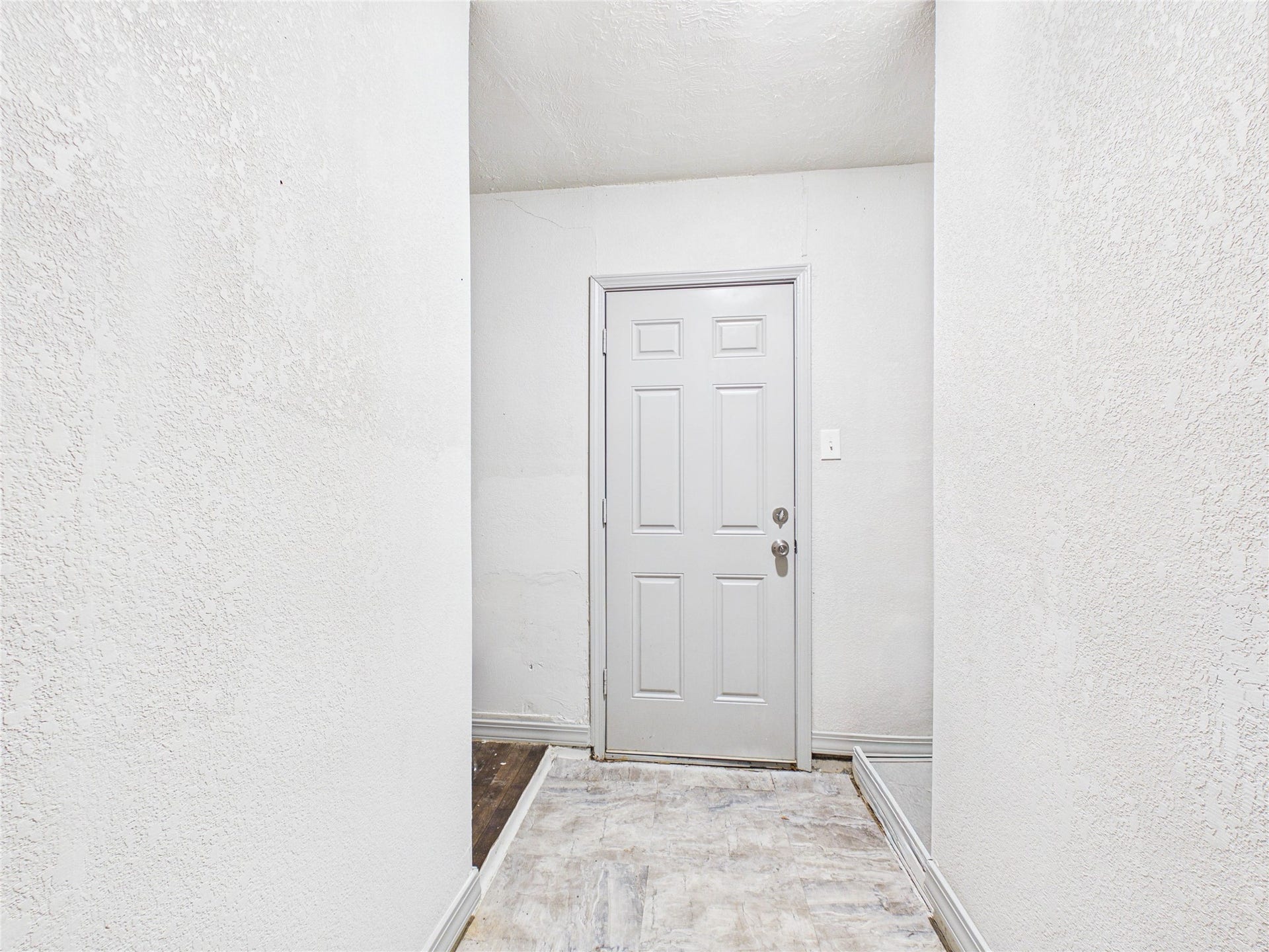 302 Sycamore Drive, Hitchcock, TX 77563 This door leads to the side of the house that has the laundry room