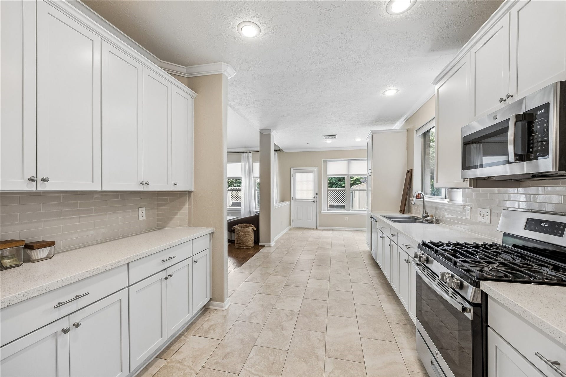 Sunny breakfast nook overlooking the backyard, creating the perfect spot for casual dining and morning coffee.