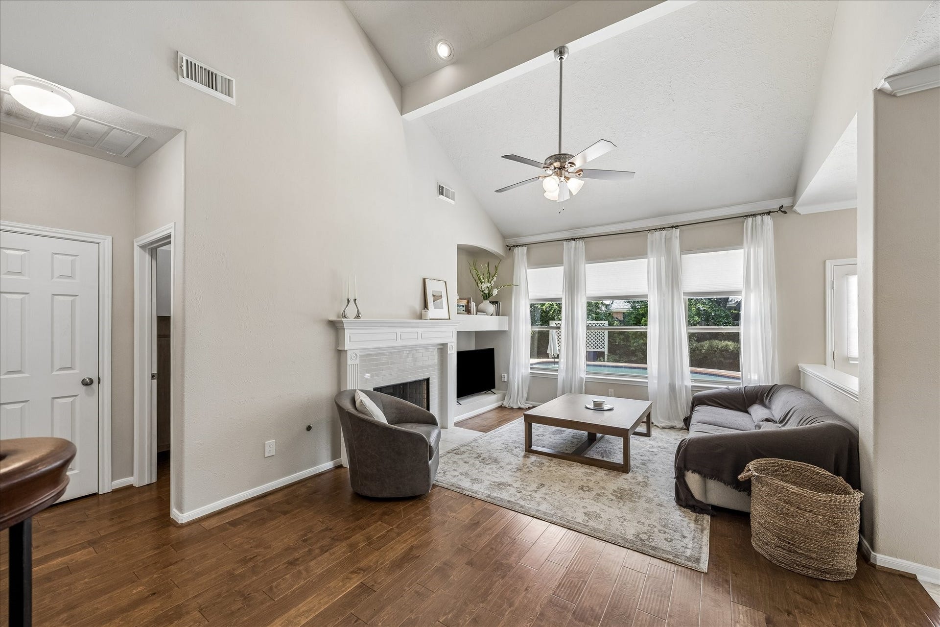 Open-concept living area seamlessly connected to kitchen and breakfast space, creating an ideal flow for entertaining.