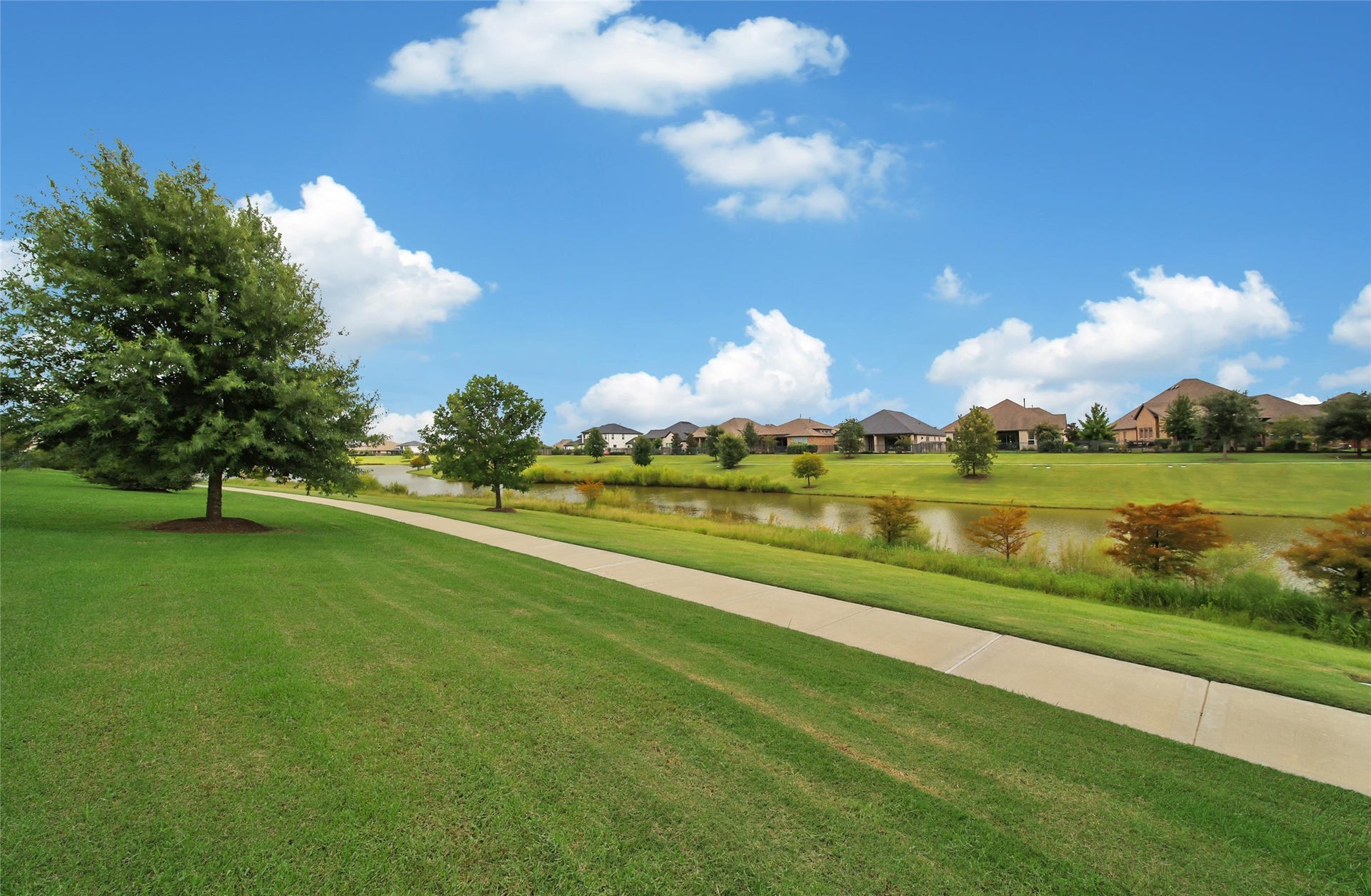 23935 Birchwood Lake Lane, Katy, TX 77493 Step out your back gate and explore the open space, hike or bike the trails, fish in the lake!!