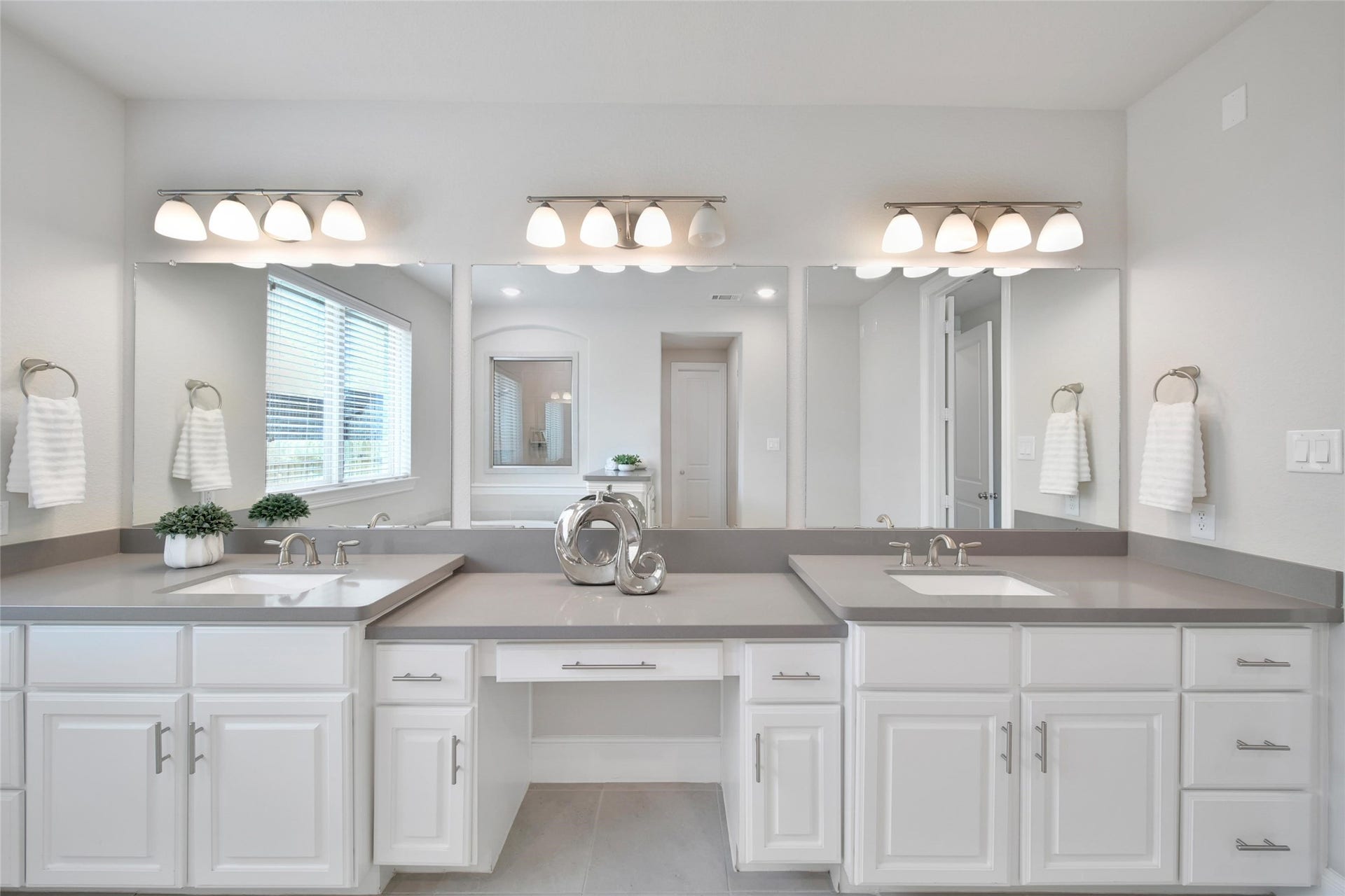 23935 Birchwood Lake Lane, Katy, TX 77493 Ample space allows two to get ready comfortably each day, complete with a sit-down vanity for added convenience.