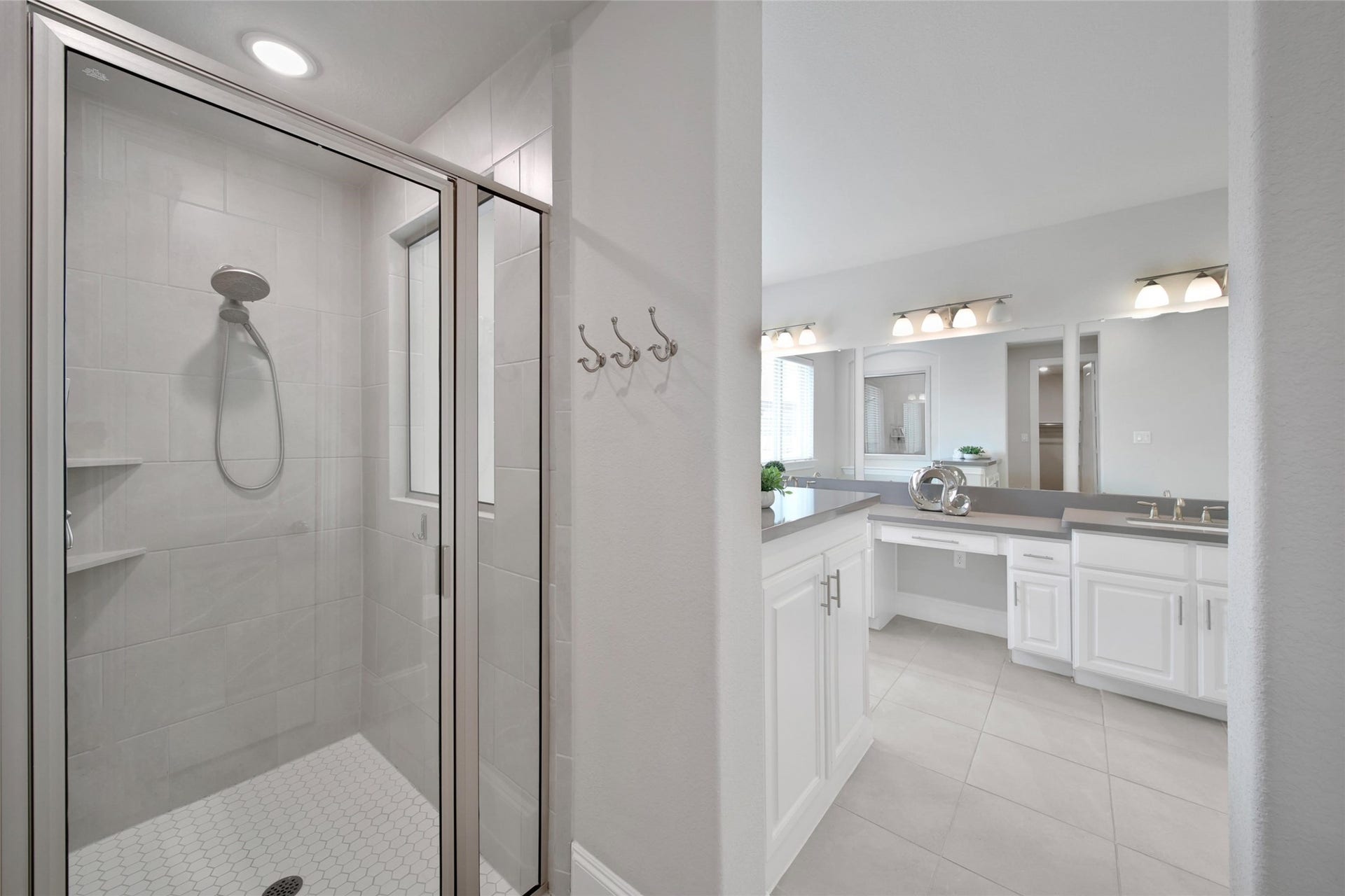 23935 Birchwood Lake Lane, Katy, TX 77493 The separate shower offers a refreshing retreat, perfect for washing away the worries of the day.