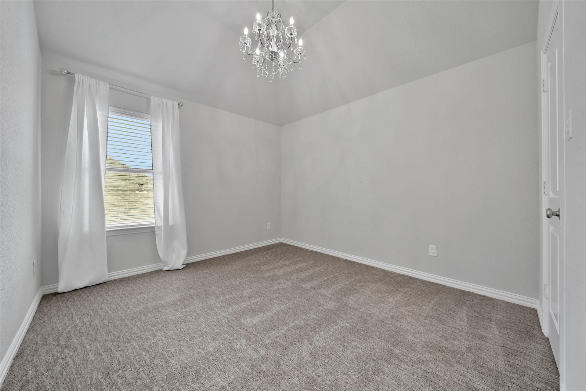 23935 Birchwood Lake Lane, Katy, TX 77493 The upstairs bedroom boasts a beautiful chandelier