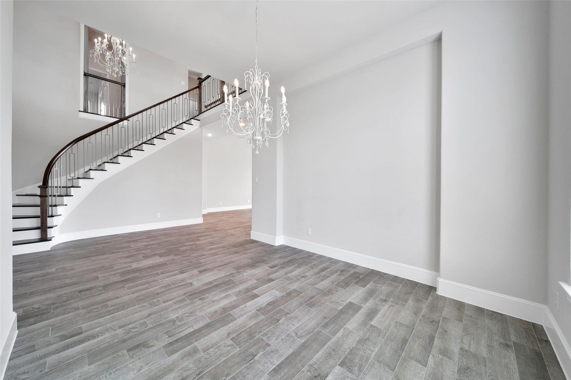 23935 Birchwood Lake Lane, Katy, TX 77493 The dining room is beautifully illuminated by a gorgeous custom chandelier.