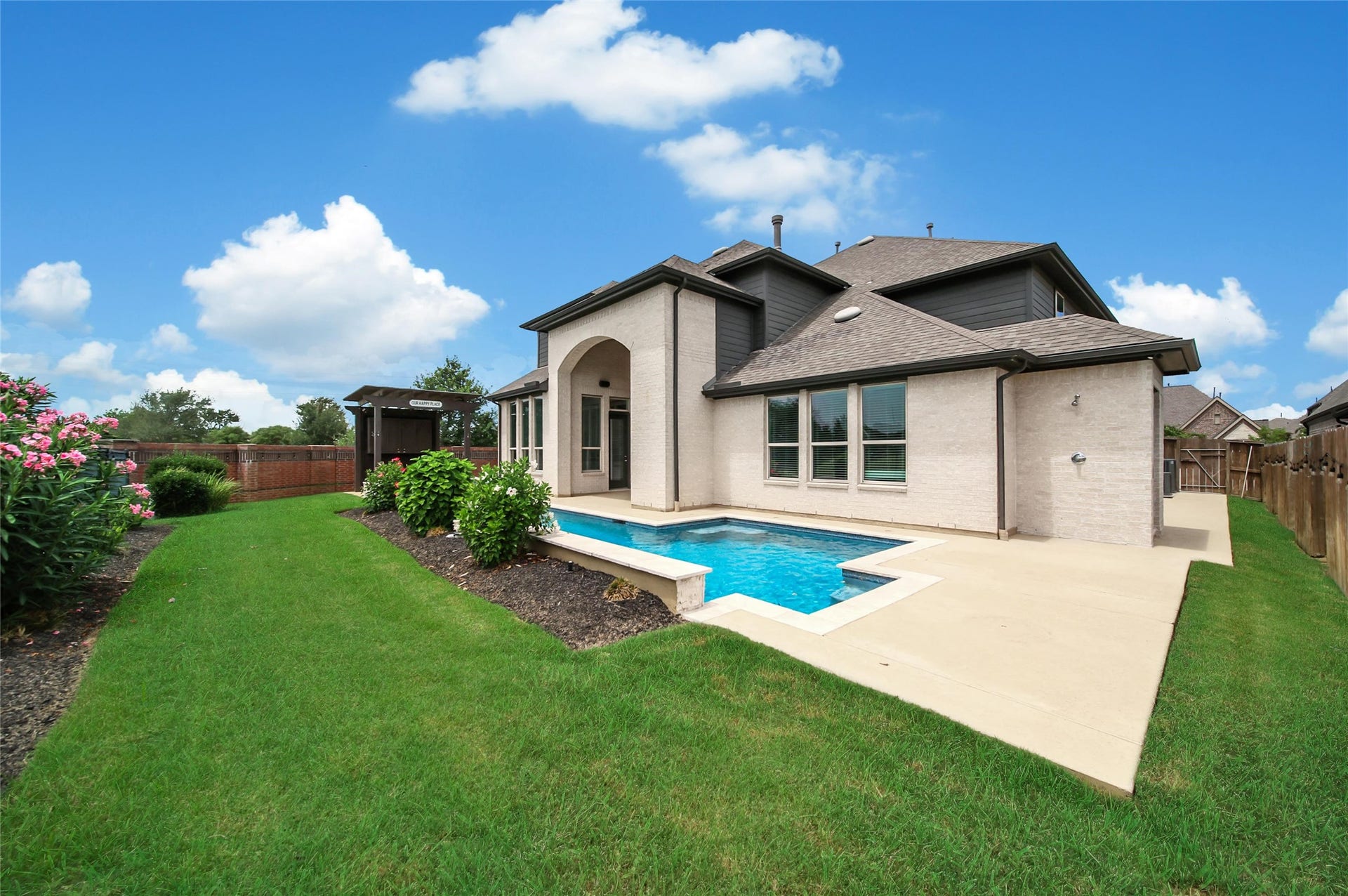 23935 Birchwood Lake Lane, Katy, TX 77493 Ample green space surrounds the pool, giving your furry family members plenty of room to play and explore.