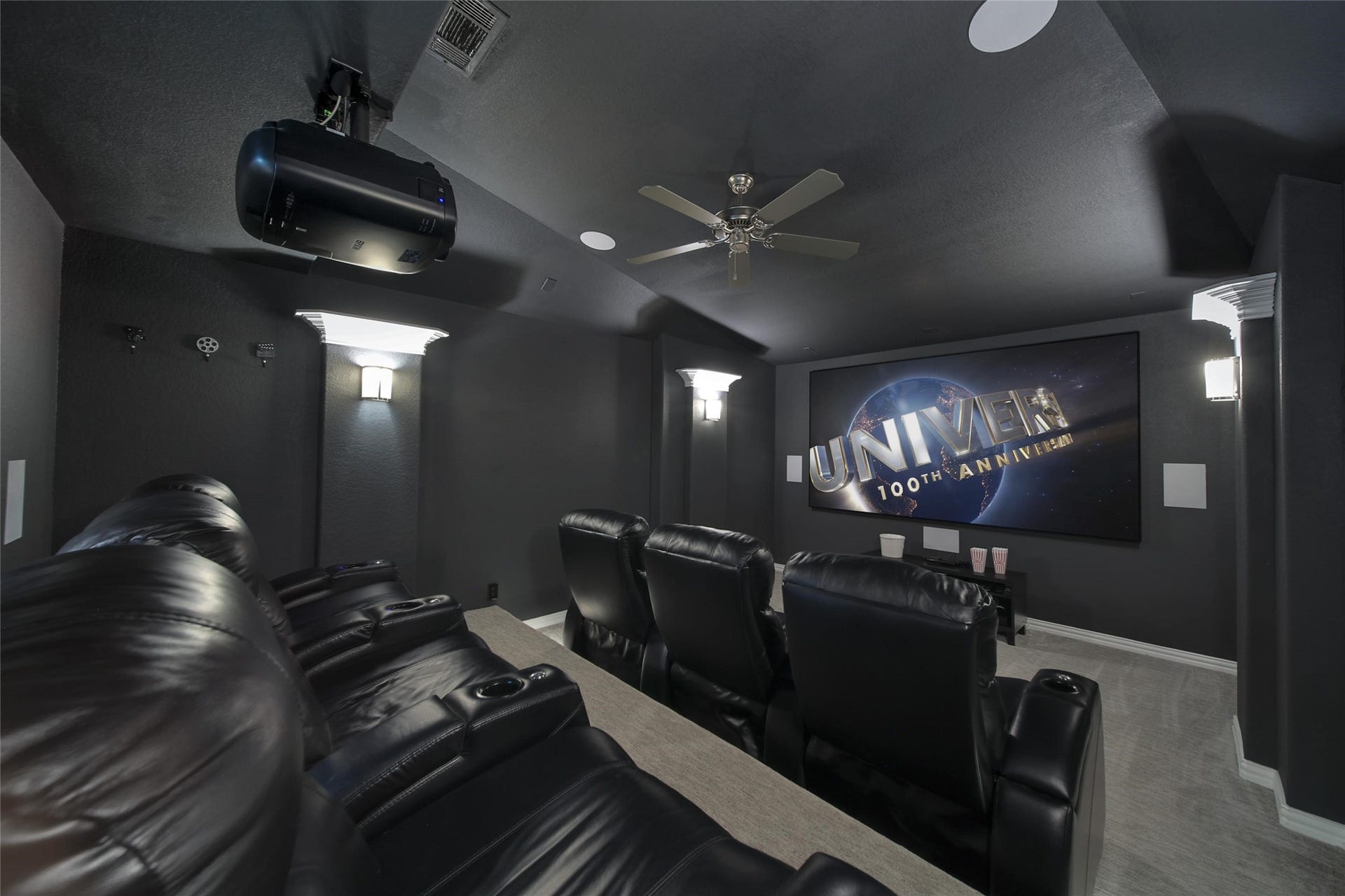 23935 Birchwood Lake Lane, Katy, TX 77493 Movie Nights just got a whole lot better! Tiered seating with step lighting and premium recliners offer unobstructed viewing, while wall scounces set the perfect mood.