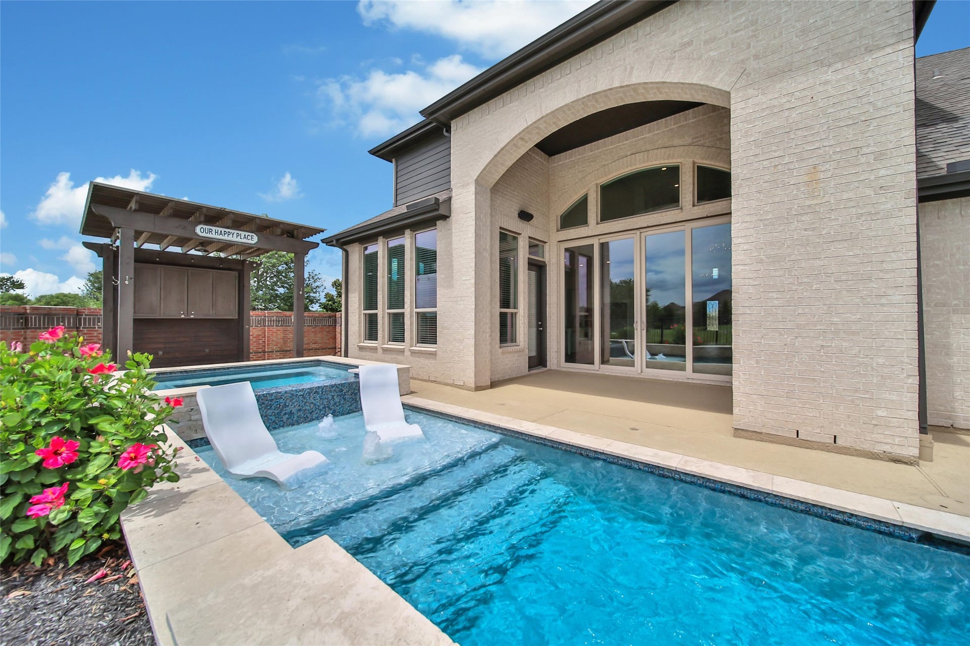 23935 Birchwood Lake Lane, Katy, TX 77493 The shallow submerged ledge perfect for lounging, sunbathing, or letting kids safely play in the water.