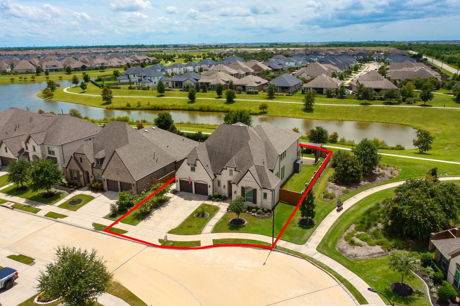 23935 Birchwood Lake Lane, Katy, TX 77493 Location is everything, and this home deliversnestled on a beautiful corner lot with a serene lake backdrop, it showcases all the beauty nature has to offer!