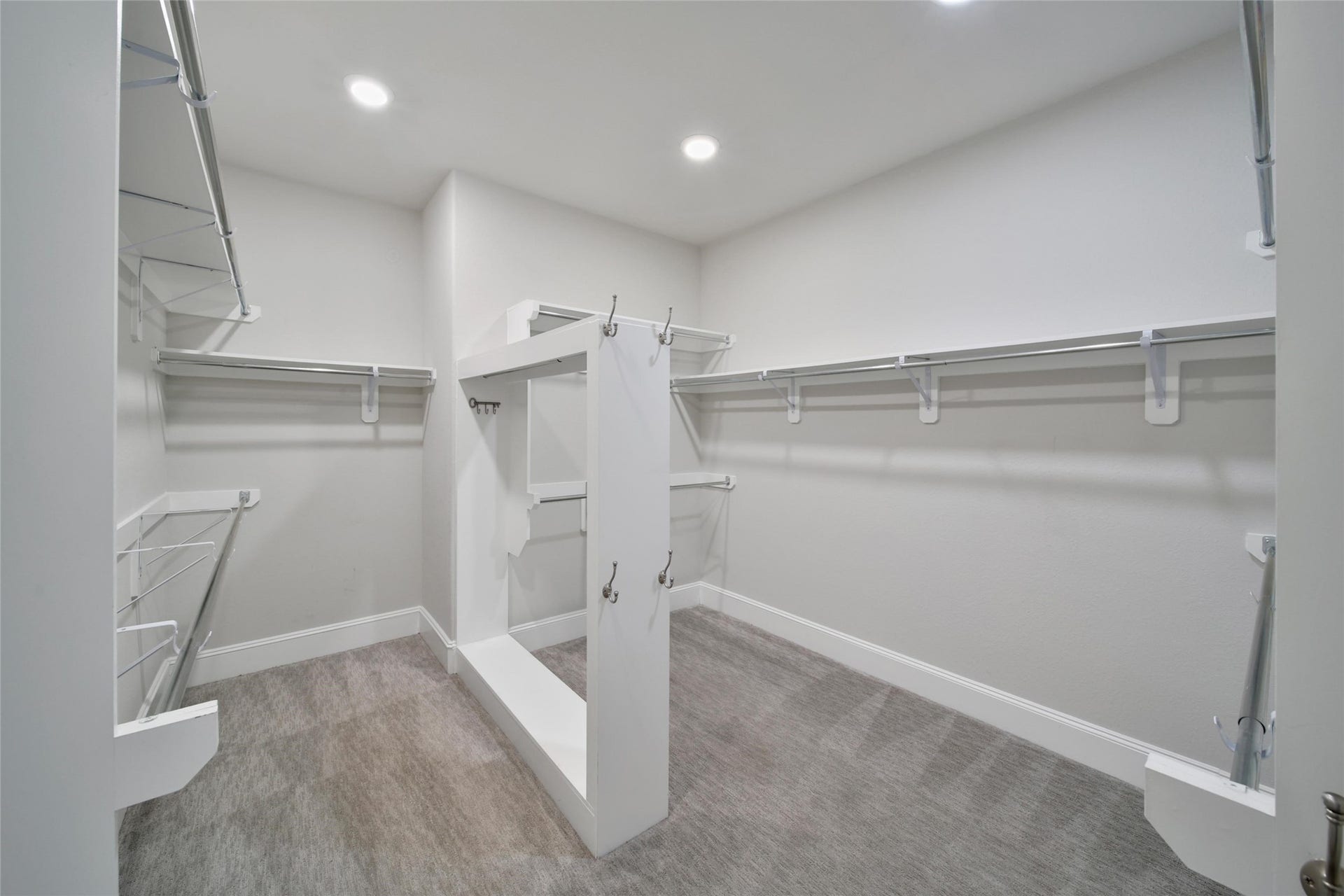 23935 Birchwood Lake Lane, Katy, TX 77493 The expansive walk in closet is a fashion lovers dream featuring custom designed hanging space and effortless organizatiom options.