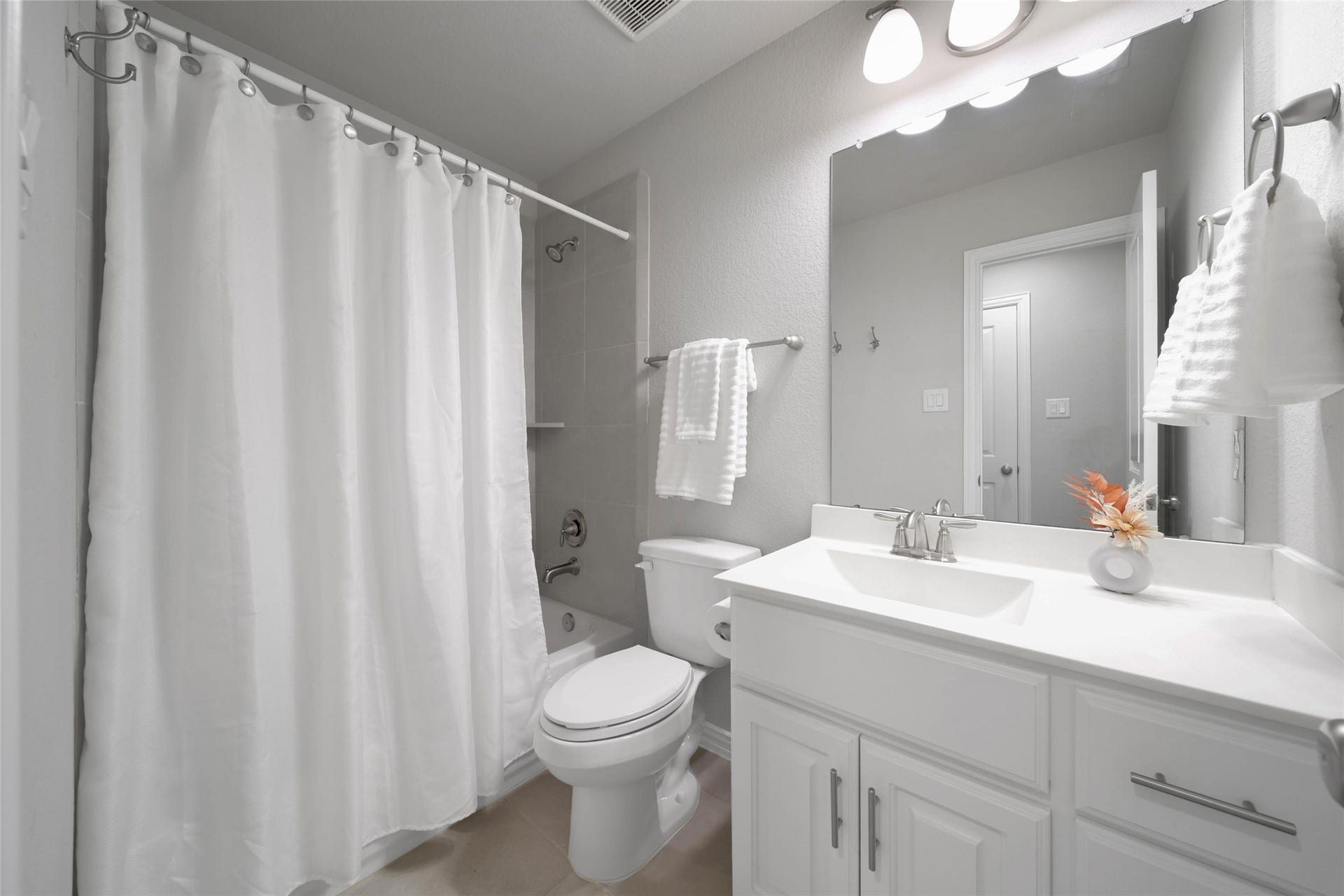 23935 Birchwood Lake Lane, Katy, TX 77493 The bedroom features a private en suite bathroom for added comfort and convenience.