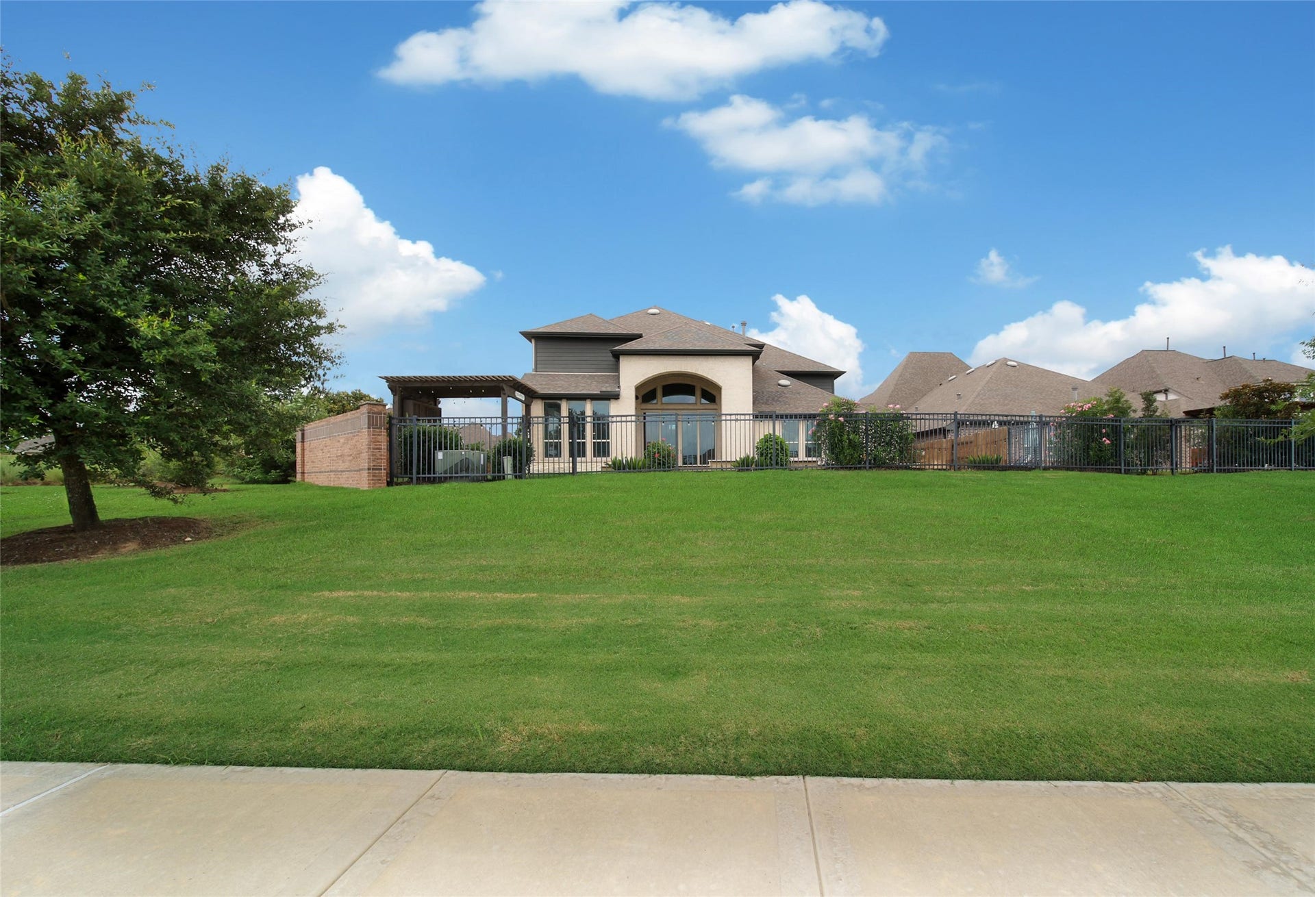 23935 Birchwood Lake Lane, Katy, TX 77493 With no back neighbors, youll enjoy uninterrupted views and serene privacy, just nature beyond the fence.