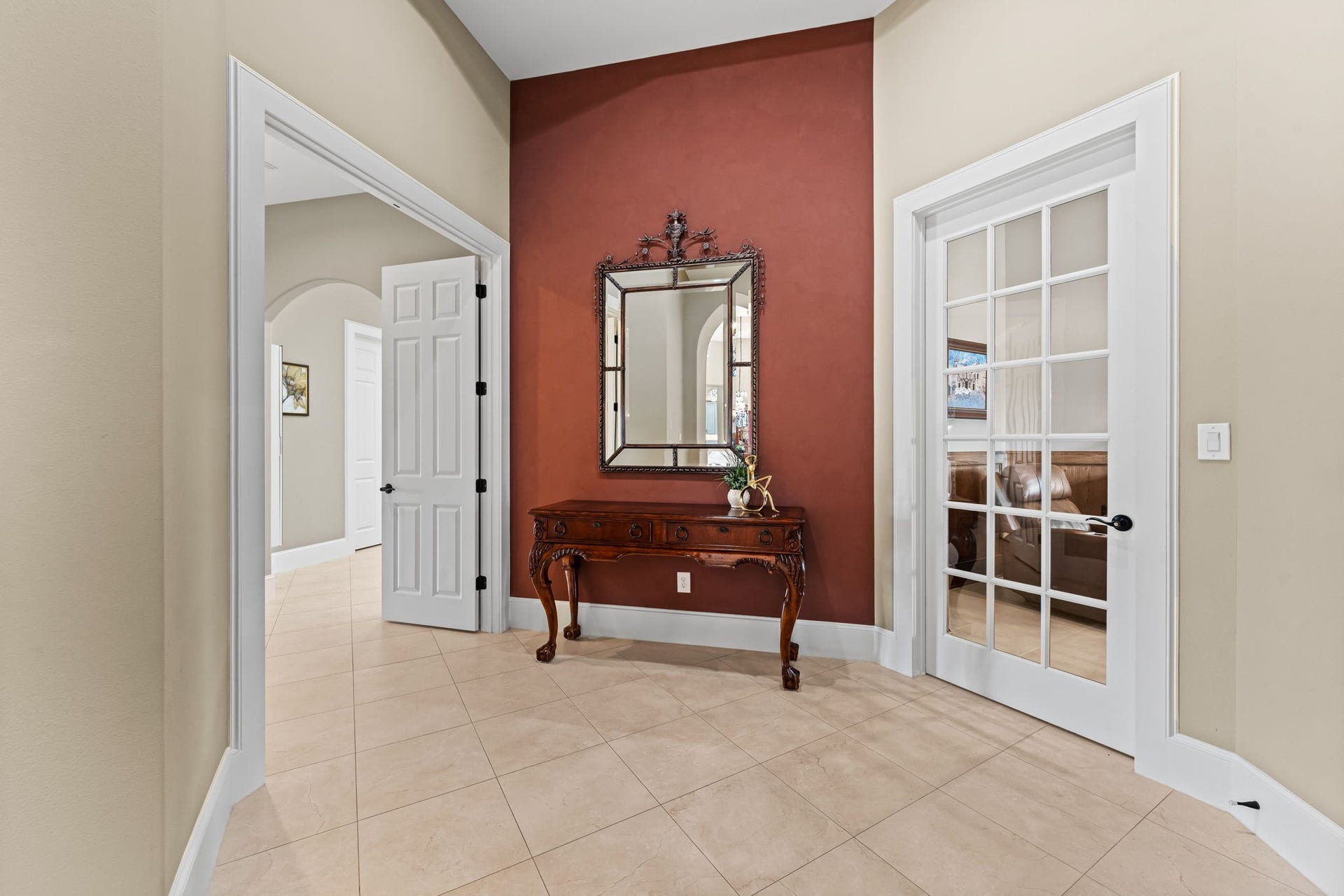 8145 Fm-1462, Rosharon, TX 77583 Double doors lead to the primary suite and the glass door is the home study.