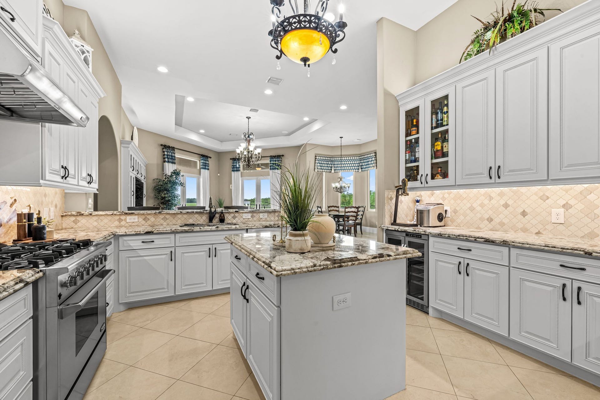 8145 Fm-1462, Rosharon, TX 77583 The kitchen is bright and is a chef dream. With a pro six burner range, wine, chiller and center Island meal preparation is a treat.