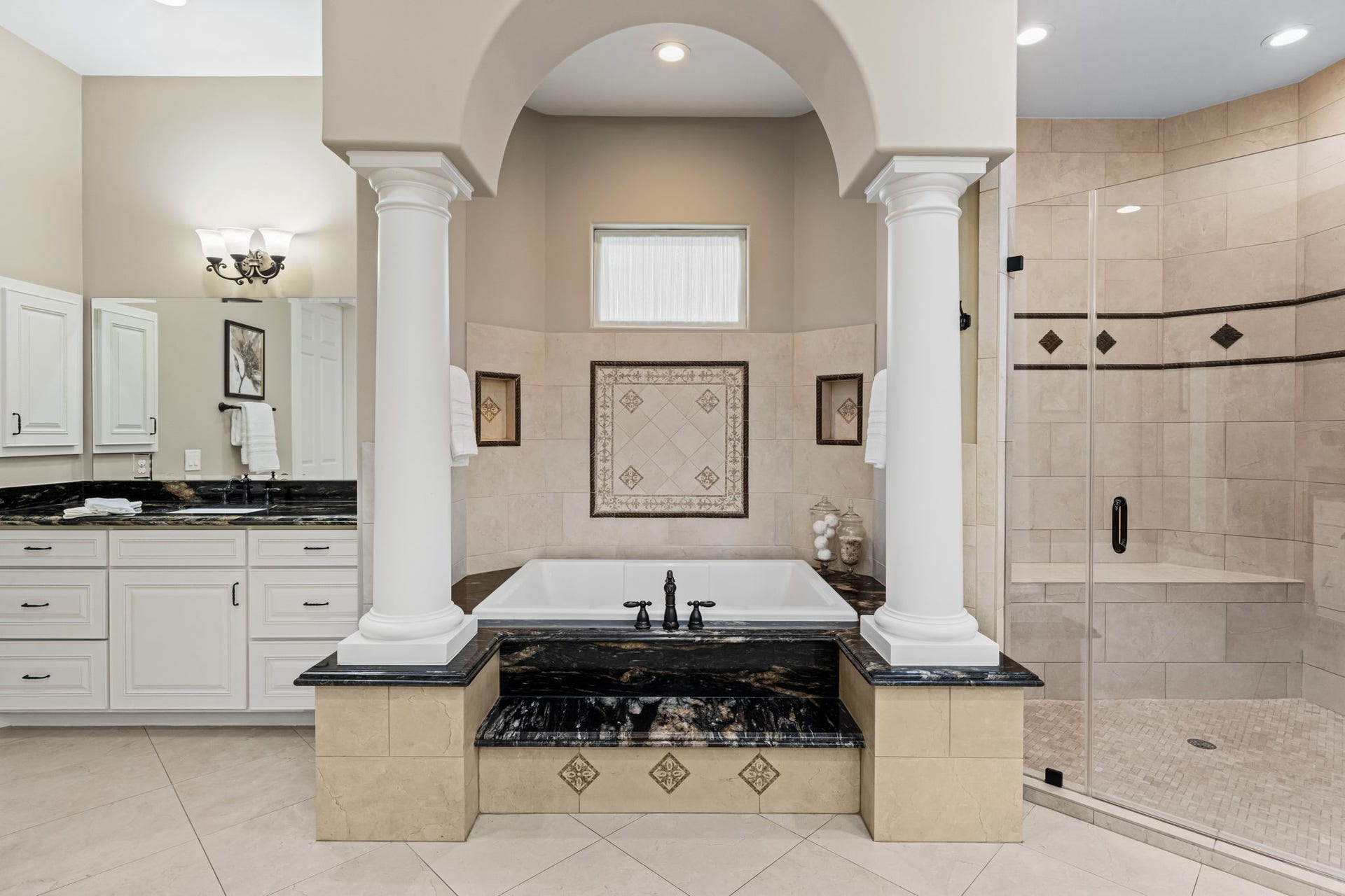 8145 Fm-1462, Rosharon, TX 77583 The elegant soaking tub is a peaceful retreat with custom tile and oversized tub.