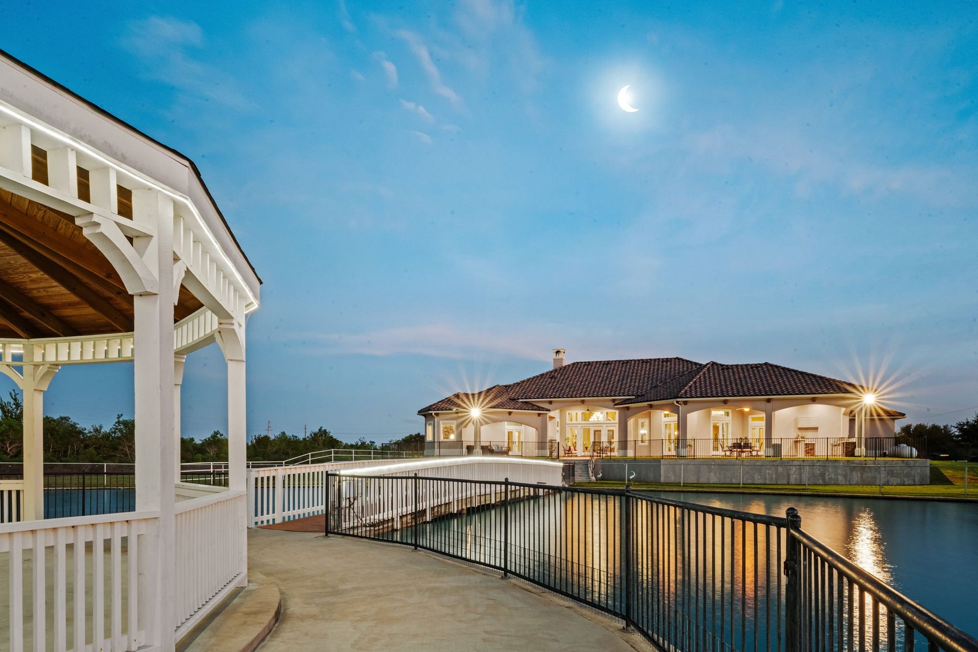 8145 Fm-1462, Rosharon, TX 77583 A picturesque 75-foot bridge crossed the pond, leading to the private gazebo island.