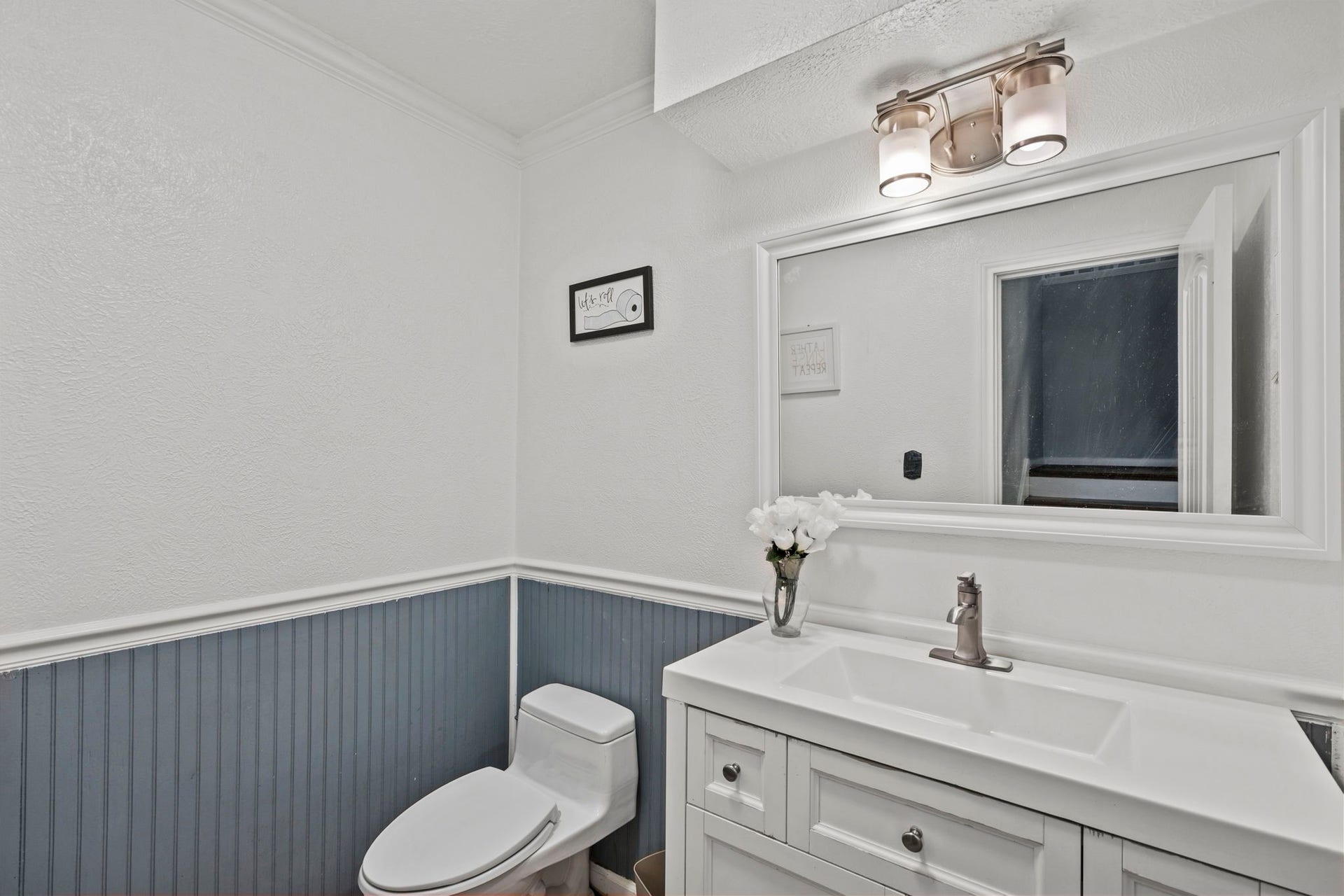7009 Avenue R, Santa Fe, TX 77510 1/2 bath downstairs.