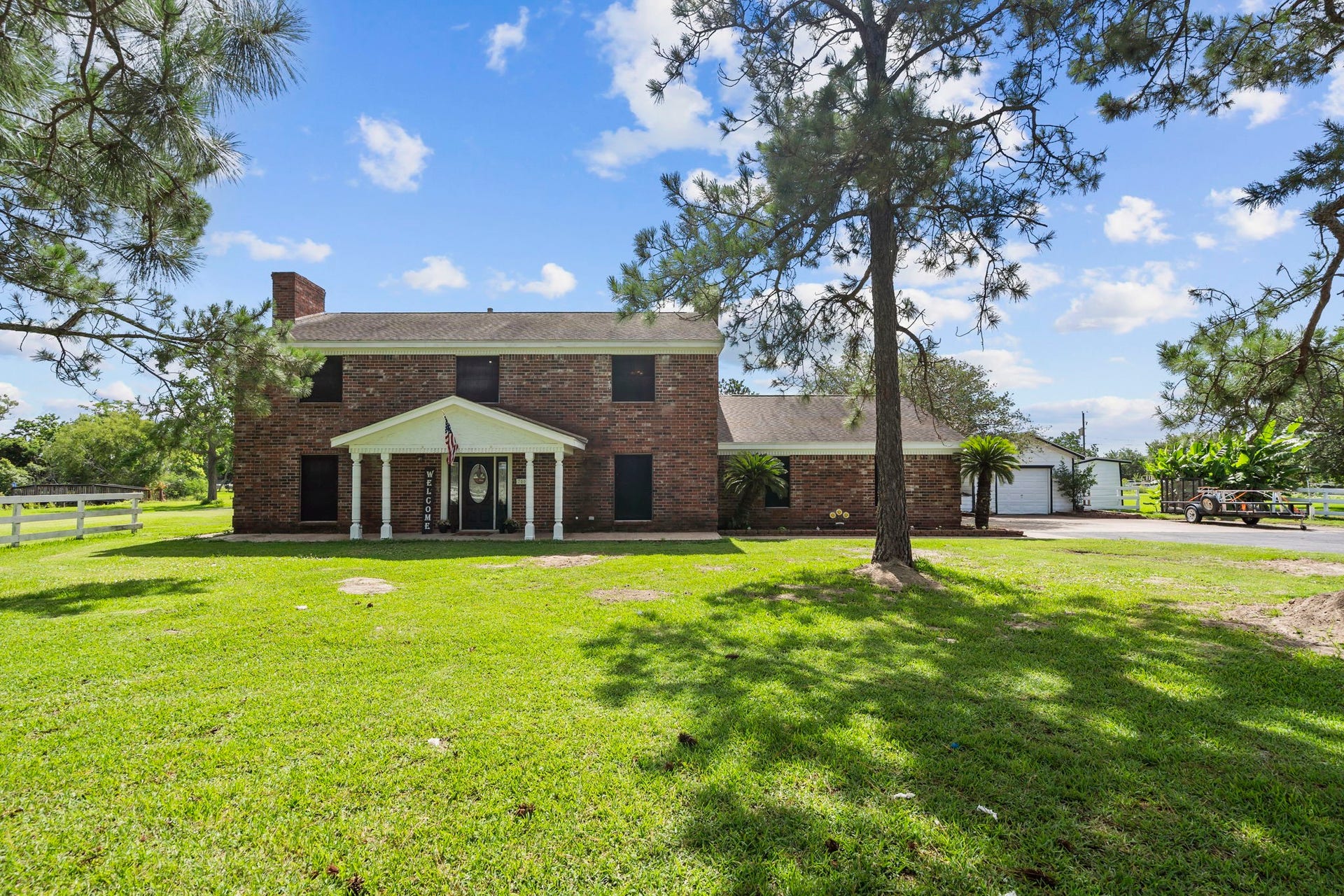 7009 Avenue R, Santa Fe, TX 77510 Beautiful house on a gorgeous 3.1-acre lot.