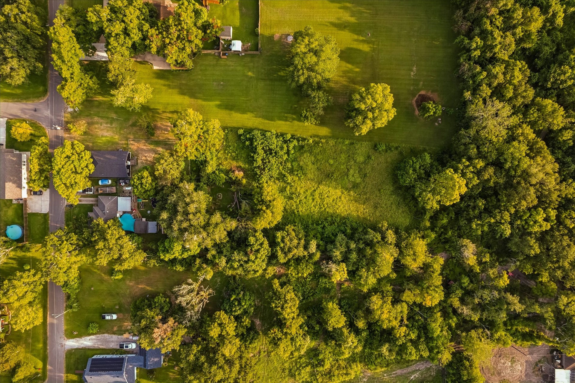 5122 Avenue L, Santa Fe, TX 77510 Overhead aerial showcasing the impressive depth of the property.