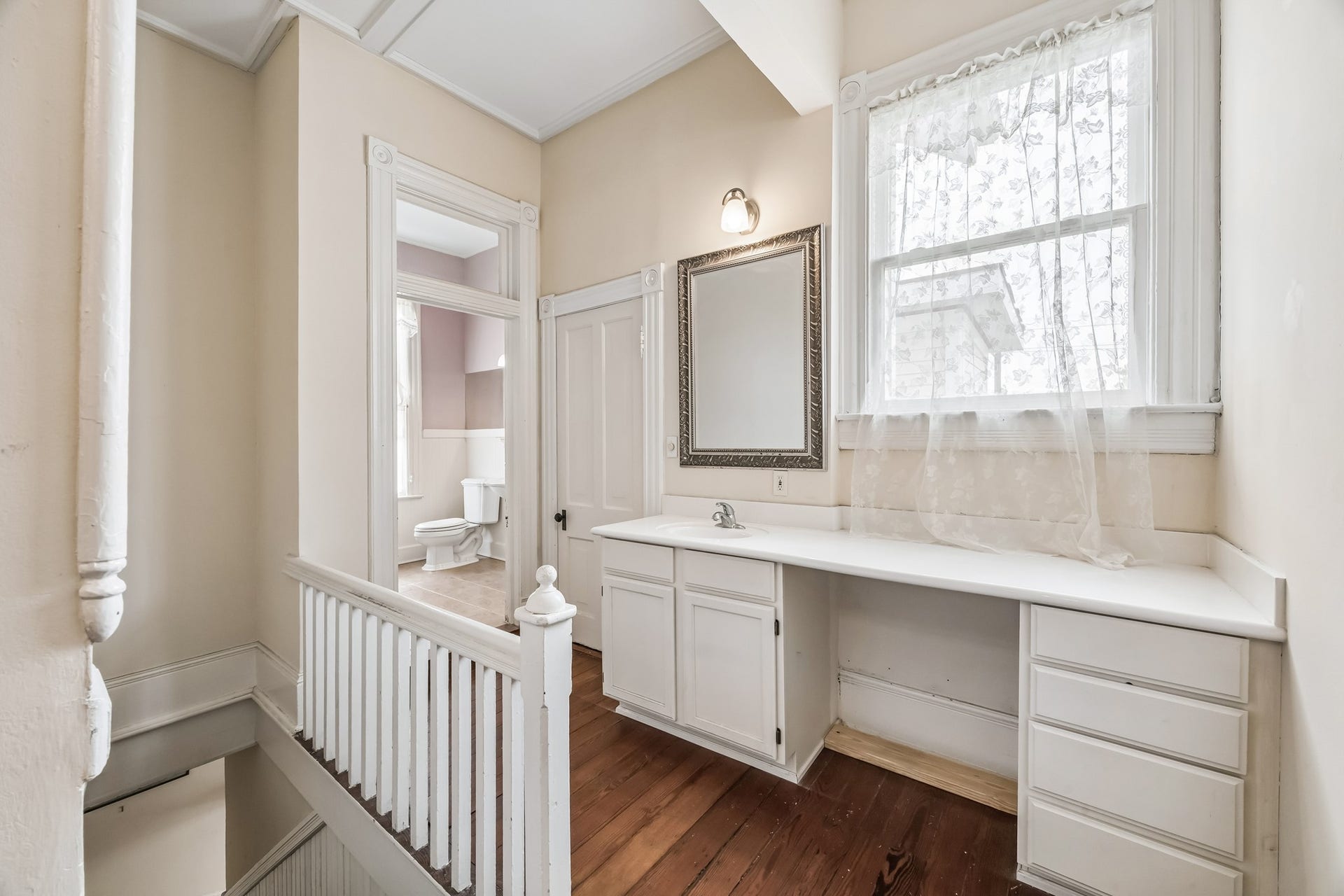 1818 Broadway Street, Galveston, TX 77550 The primary bath has a vanity area with a sink