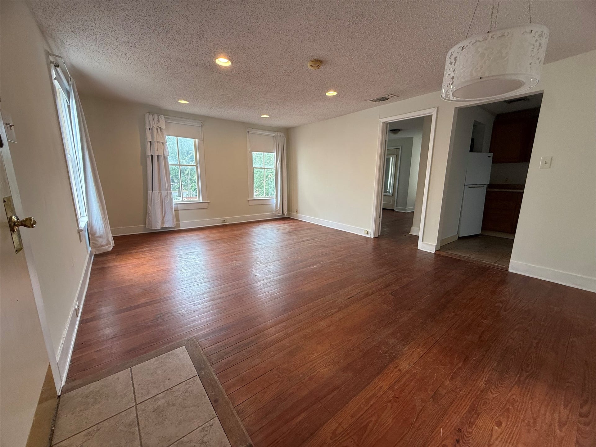 1818 Broadway Street, Galveston, TX 77550 The garage apartment provides one of the income producing units in the home. Large living area with original wood floors