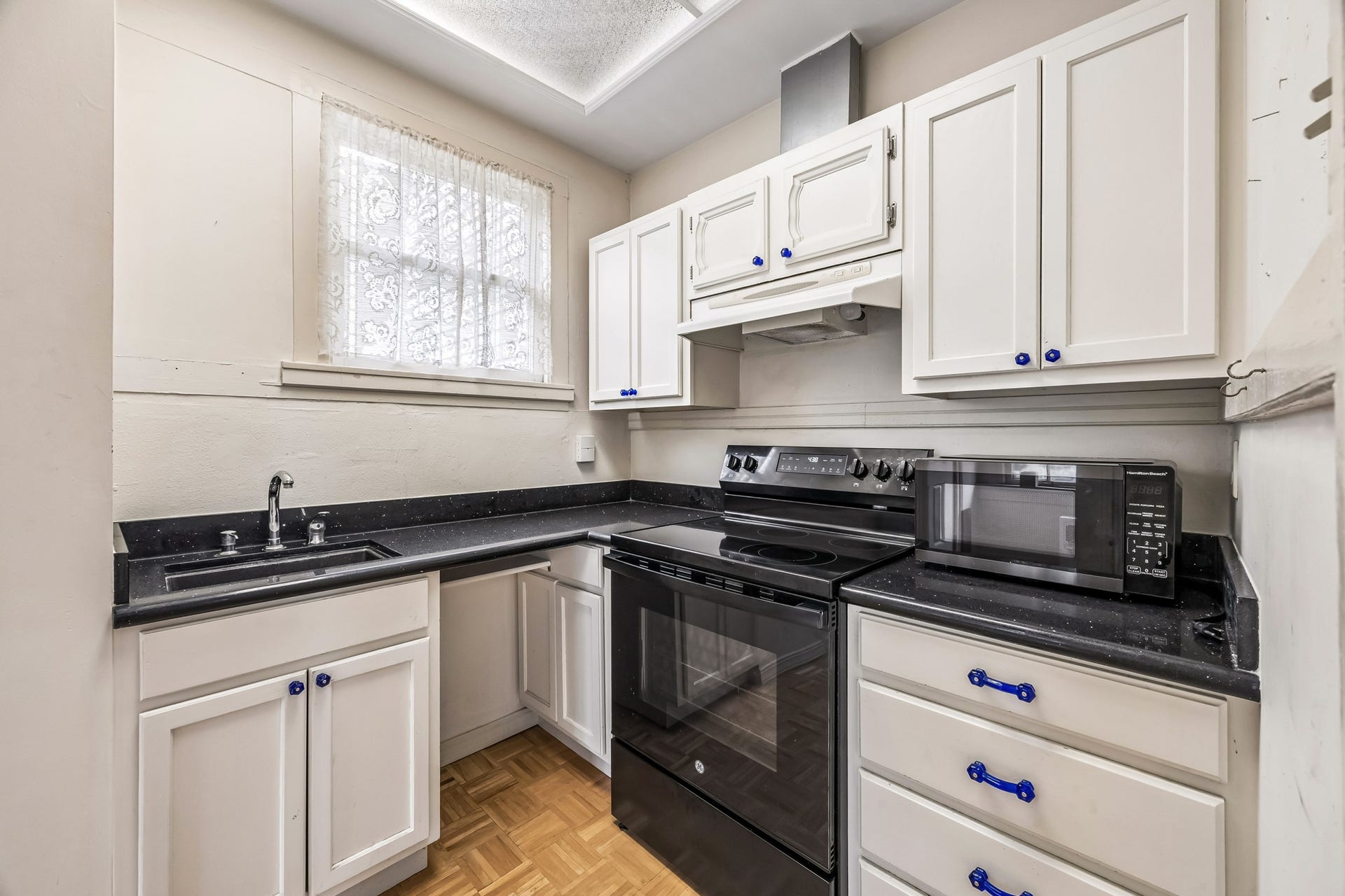 1818 Broadway Street, Galveston, TX 77550 This is where you can cook your gourmet meals after you have prepped everything on the other side of the kitchen. A thoughfully place prep sink and additional counter space adds to the funtionality of this space.