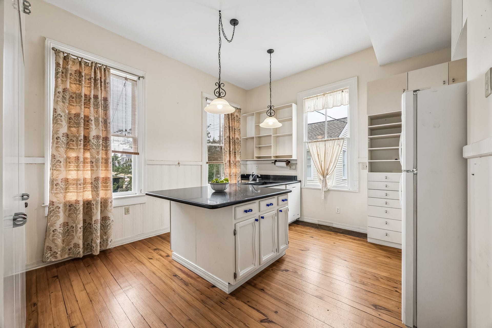 1818 Broadway Street, Galveston, TX 77550 A modern kitchen. The first room is the prep kitchen. Here you have all your storage, plenty of counter space, and a breakfast bar