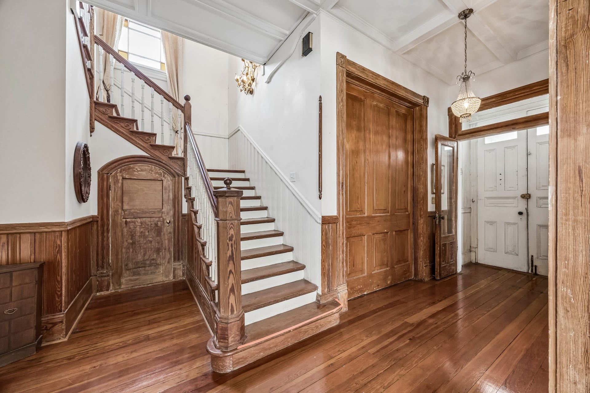 1818 Broadway Street, Galveston, TX 77550 The massive pocket door closes off the office. All the details you see are original Gorgeous! The small door leads to a powder room that has a small shower around the corner.