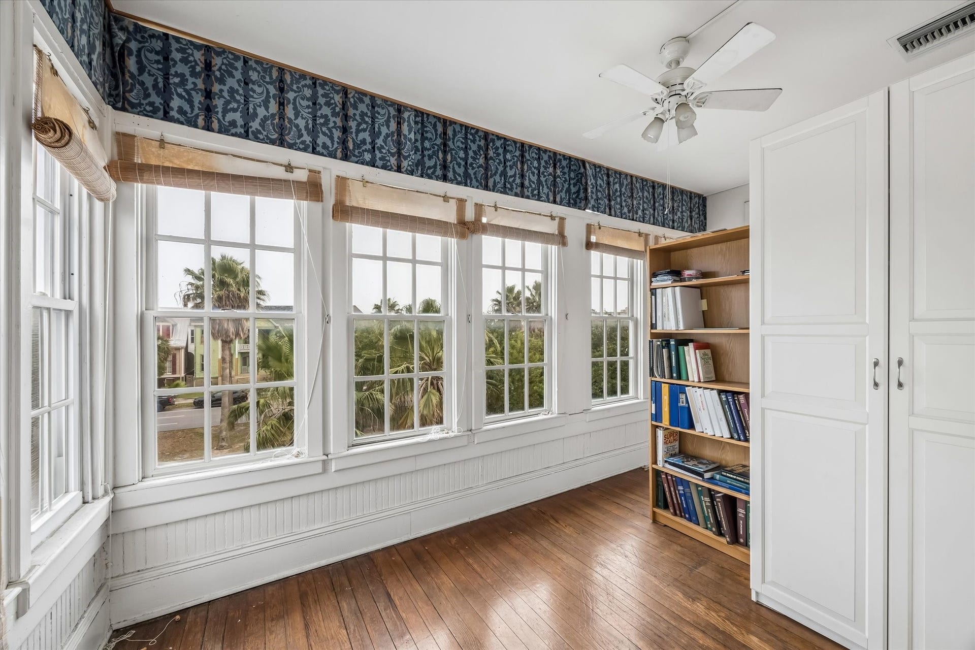 1818 Broadway Street, Galveston, TX 77550 The sun room was used as a craft room and sewing room. The cabinets can be removed to open up the entire space