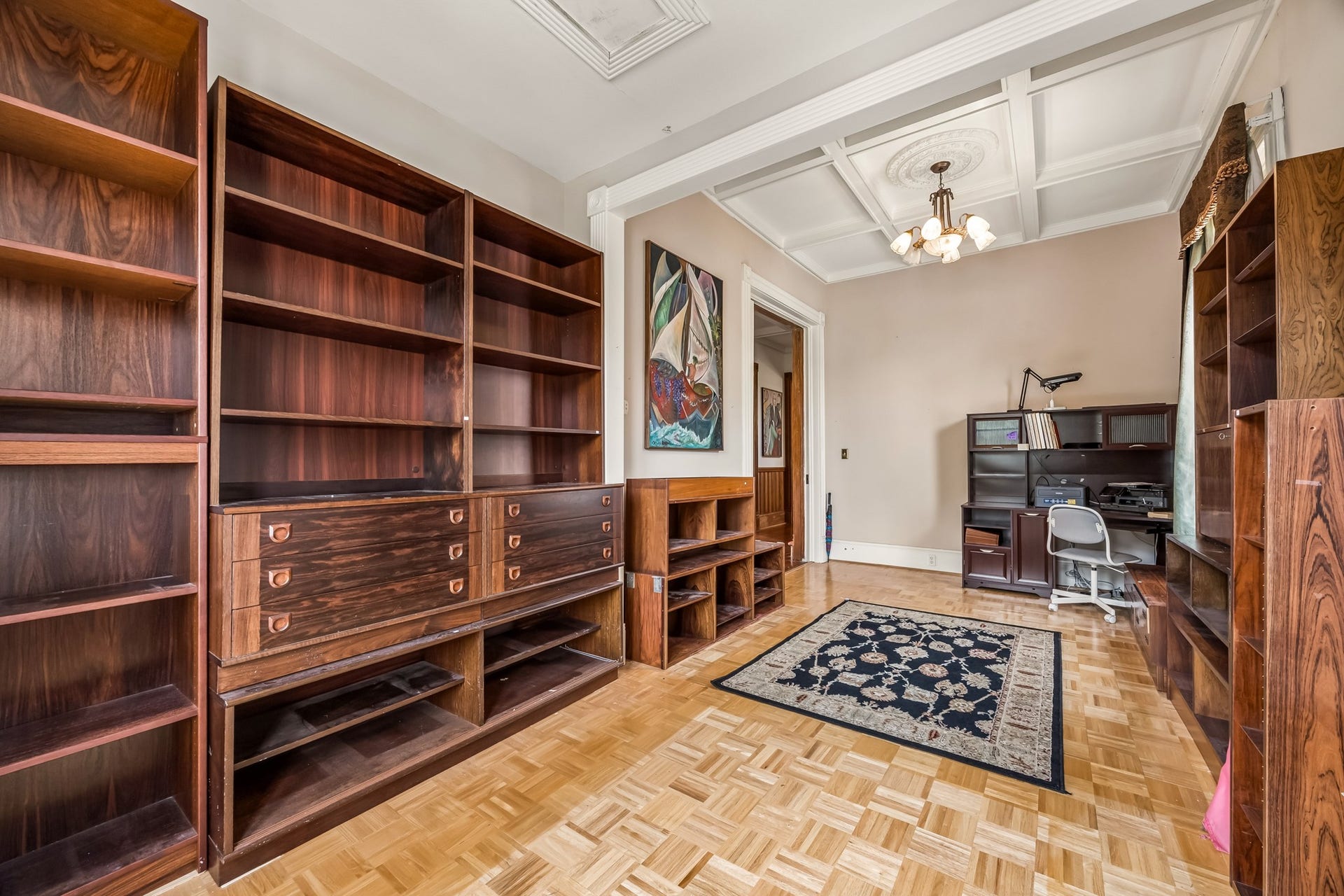 1818 Broadway Street, Galveston, TX 77550 A large home office space is located to the right of the entrance. Note the tray ceiling detail.