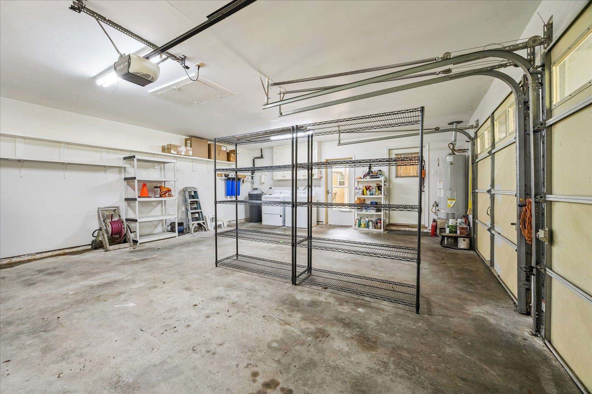 12511 Britt Road, Pearland, TX 77584 Attached 2-car garage is huge and has an automated opener for the left bay.