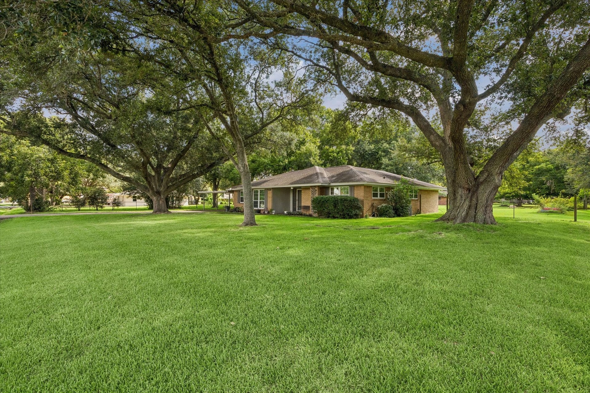 12511 Britt Road, Pearland, TX 77584 Home sits on a huge 2/3 of an acre lot with great curb appeal and mature landscaping.