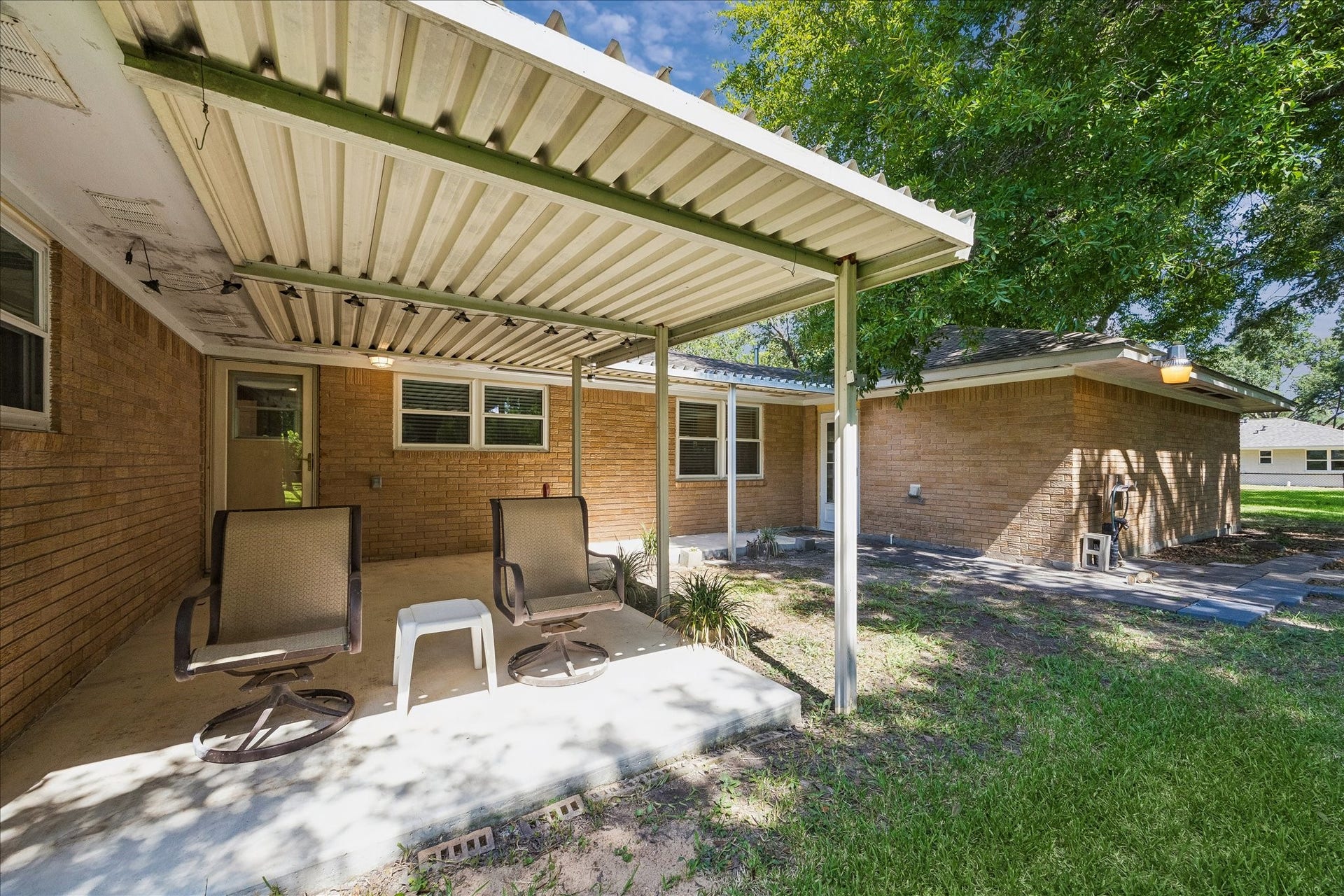 12511 Britt Road, Pearland, TX 77584 Covered back patio & breezeway leading to the garage.