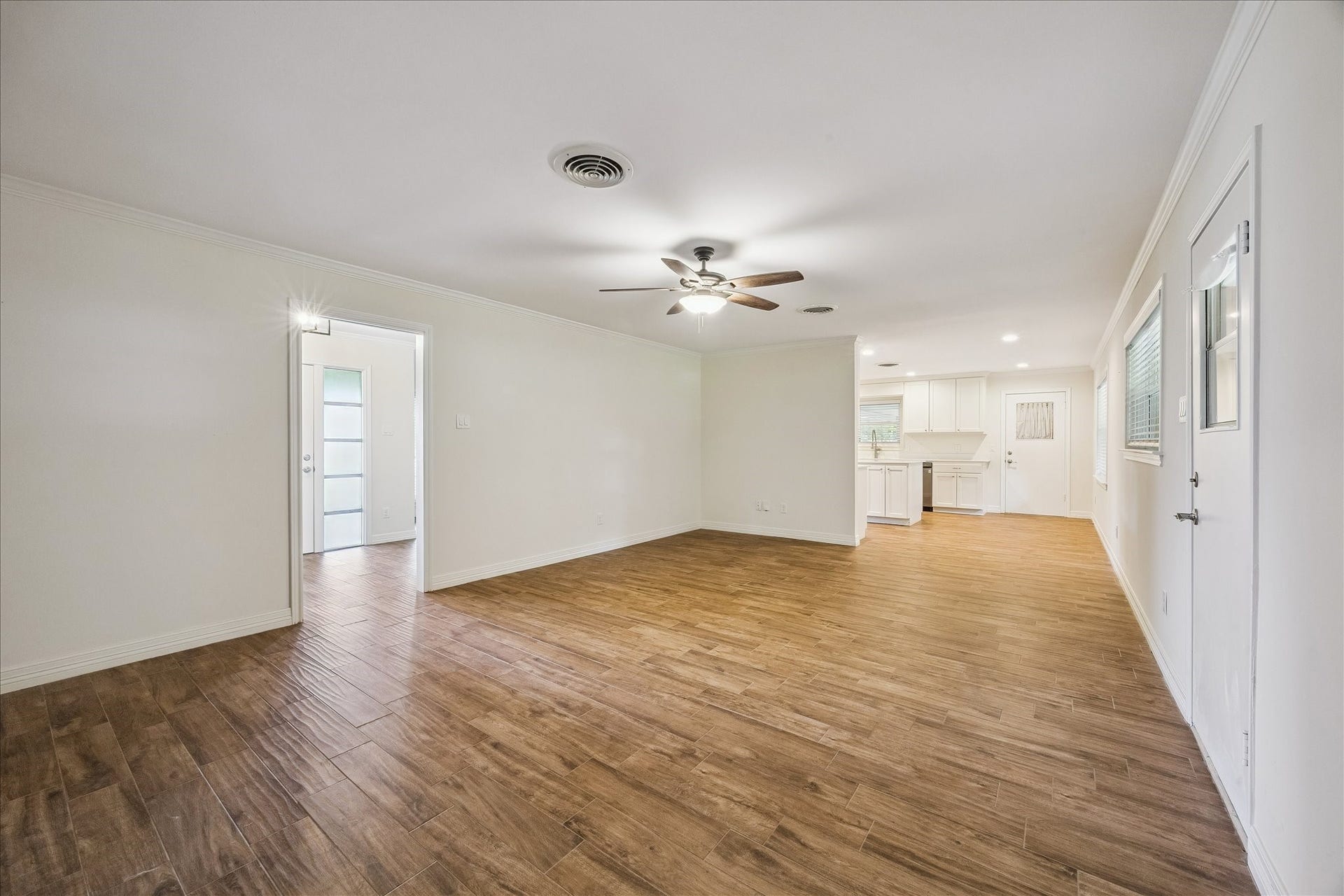 12511 Britt Road, Pearland, TX 77584 A convenient pocket door from the foyer to the den allows you to close off the entertaining areas from each other.