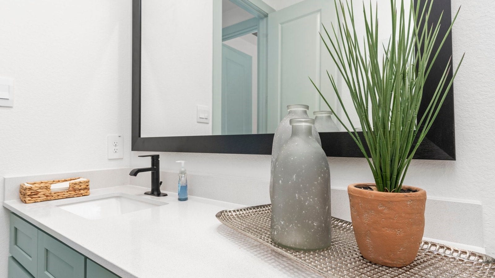 secondary bathroom with one sink