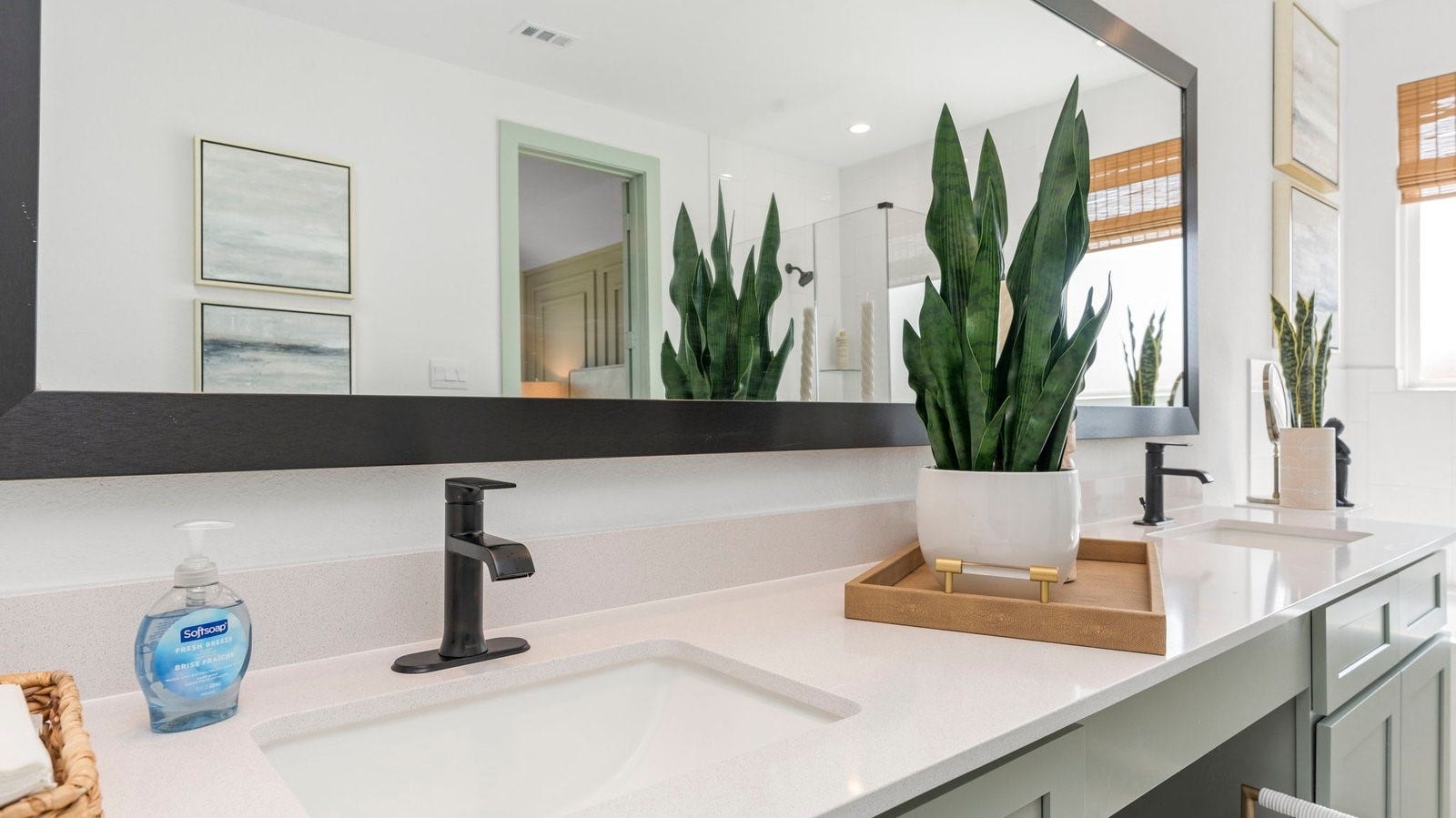 primary bathroom with dual sinks