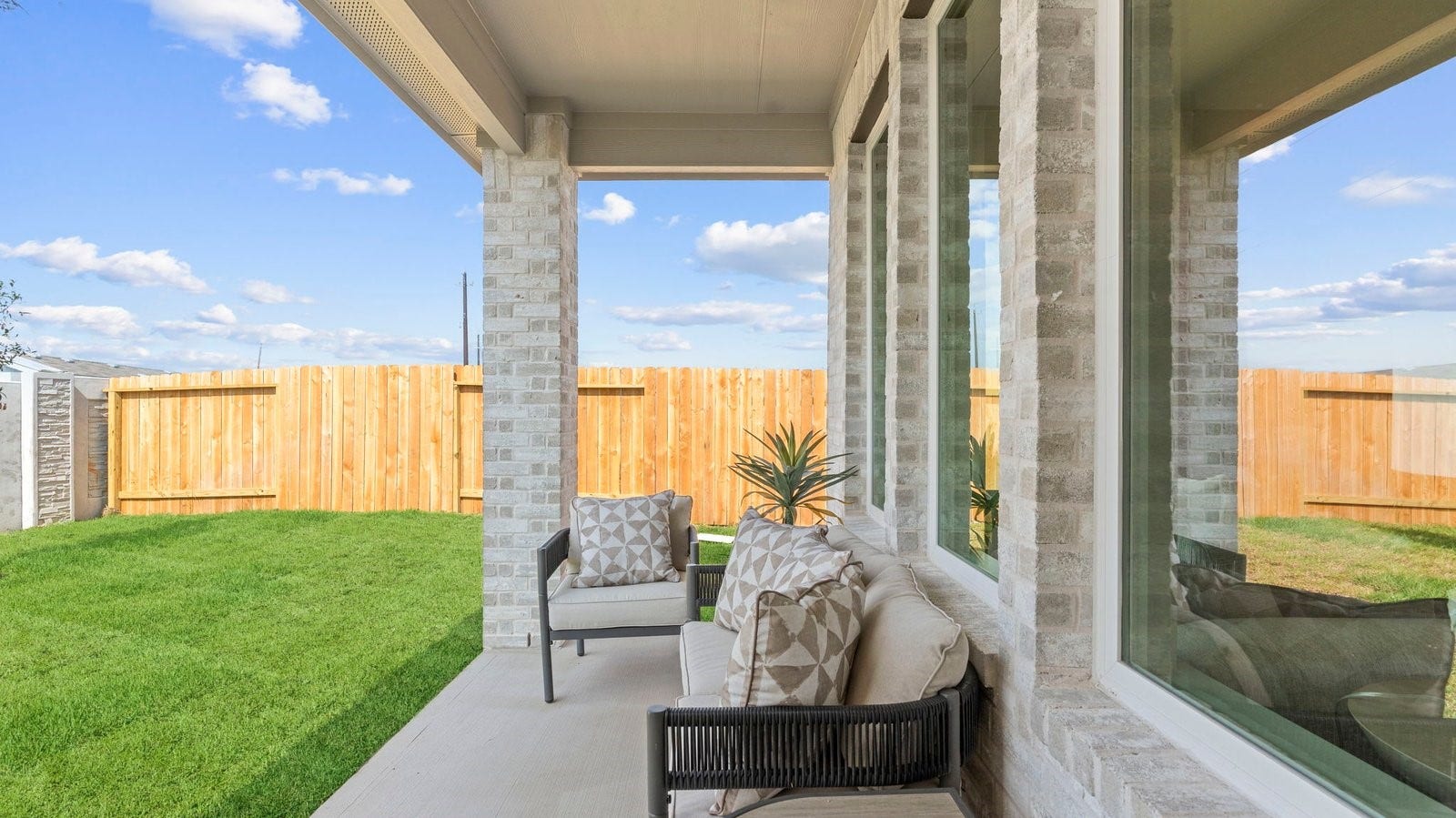 covered patio with room for outdoor furniture