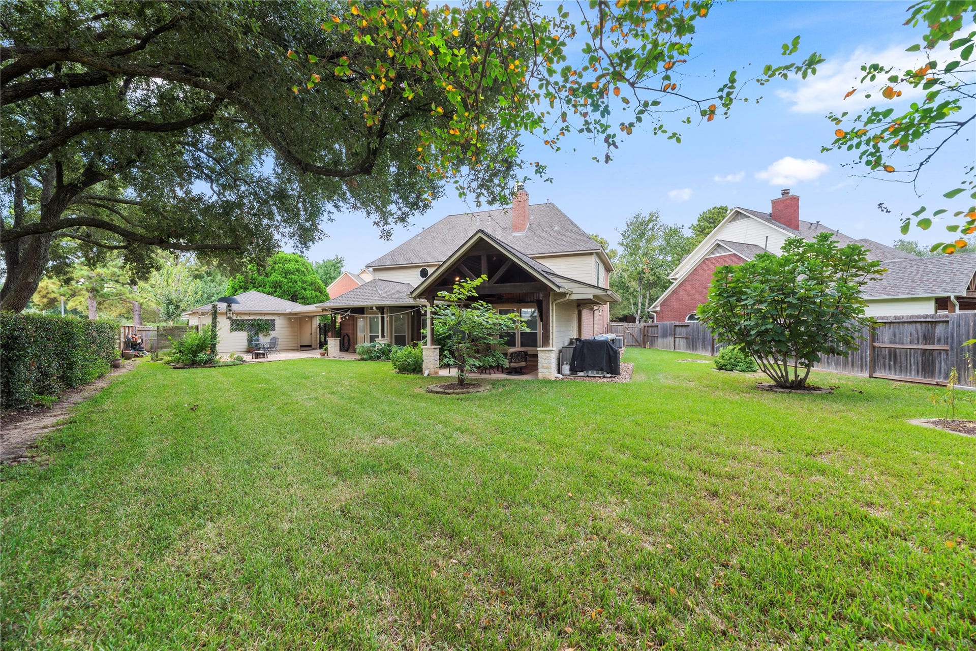 Endless possibilities in this expansive backyard.