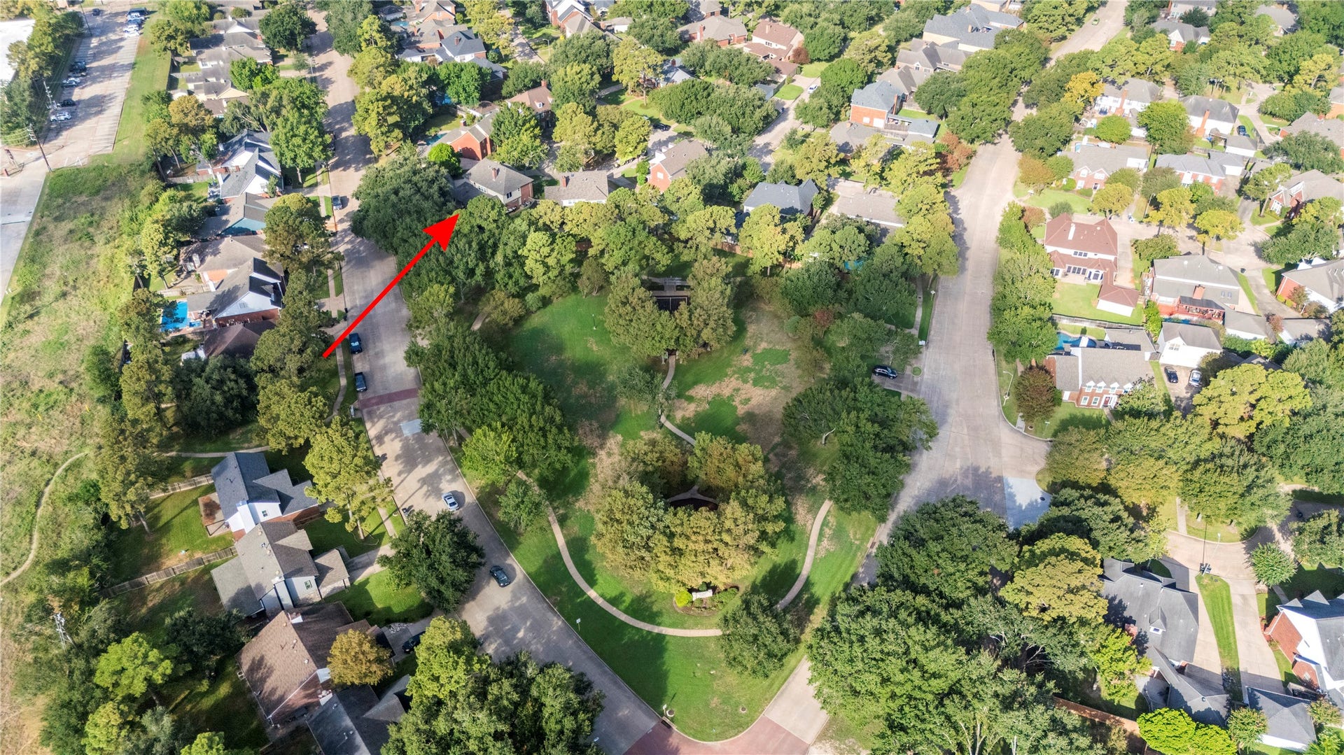 Nestled into this community greenspace, enjoy leisurely strolls and the park just steps away from the home.