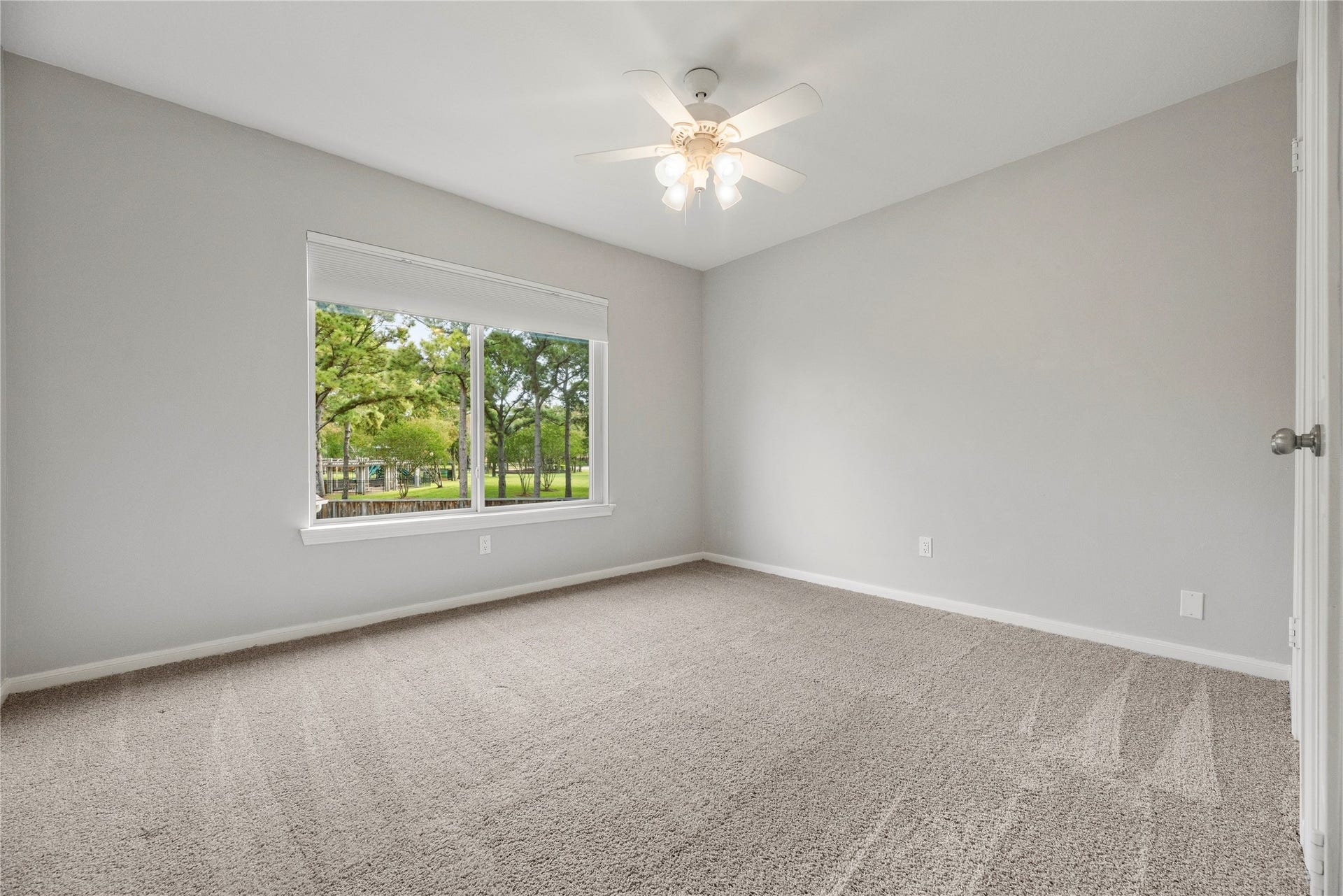 The third bedroom featuring soft carpet (upgraded pad and carpet replaced in 2022) and a generous closet.