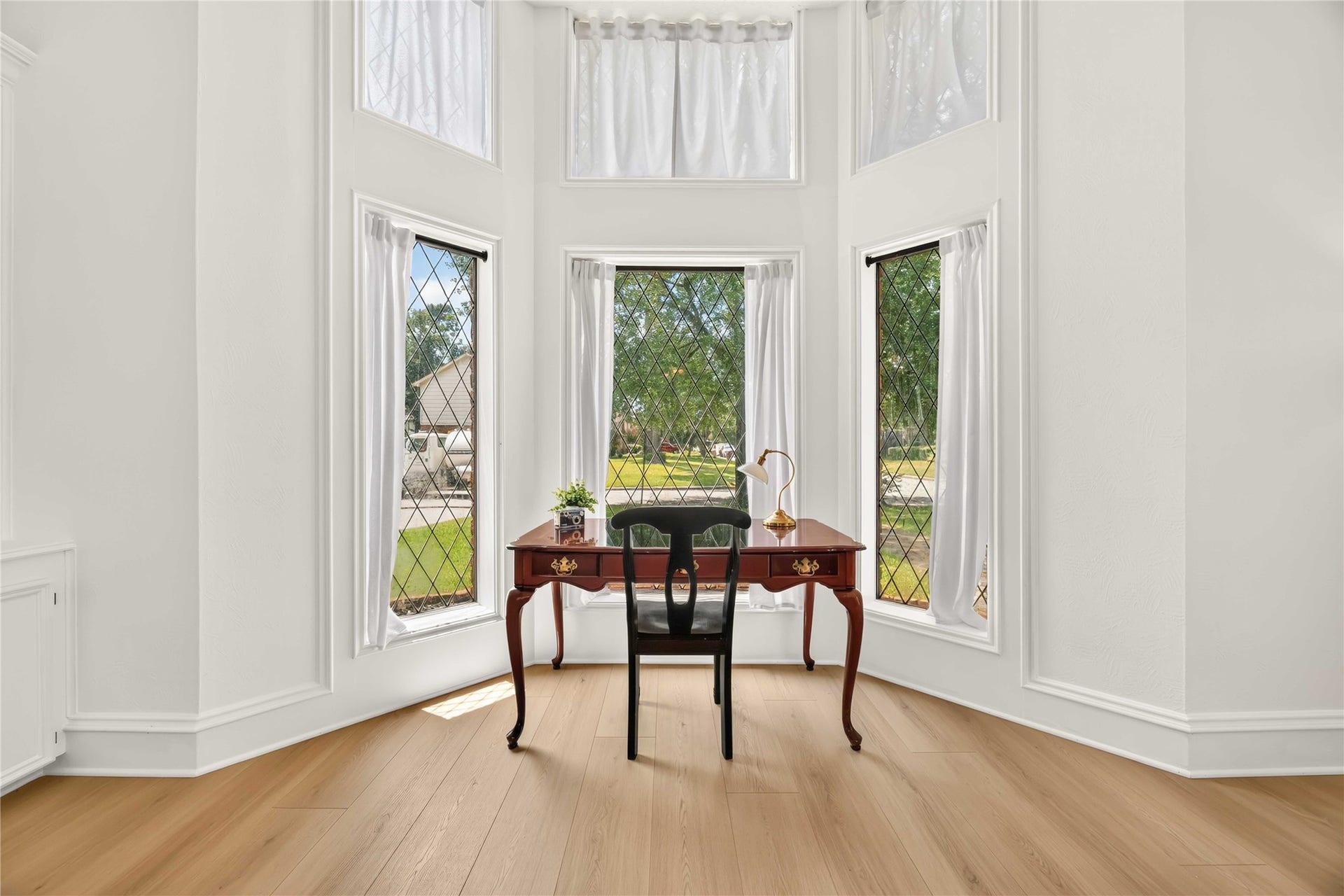 17006 Butteroak Drive, Spring, TX 77379 This light-filled nook surrounded by windows offers a peaceful place for morning coffee, reading or a quiet workspace